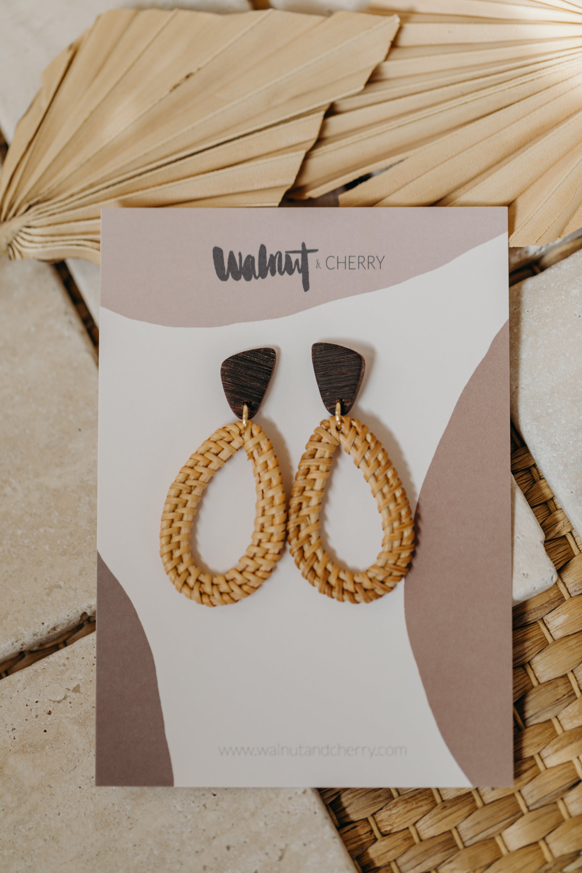 brown polymer clay earrings with rattan pendant drops