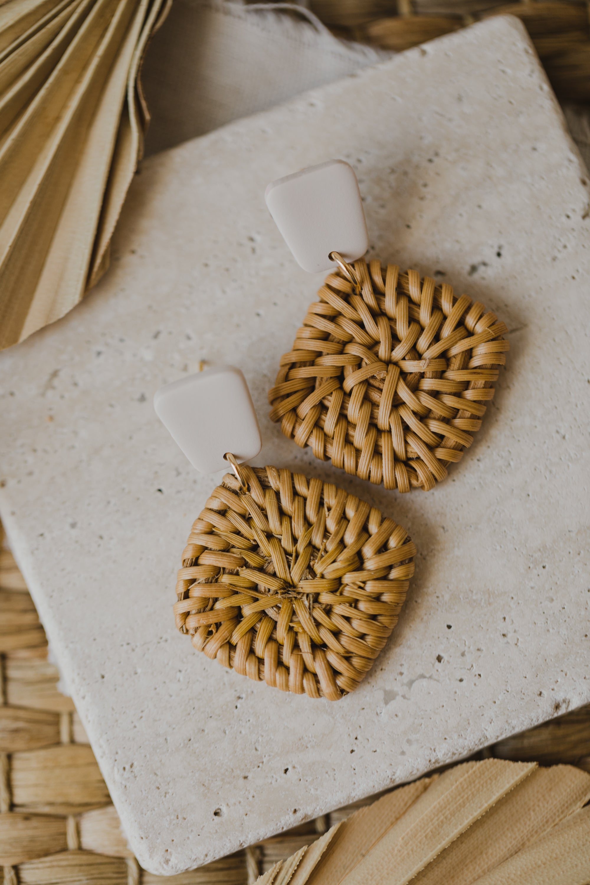 square polymer clay earrings in the color vanilla with rattan pendant square