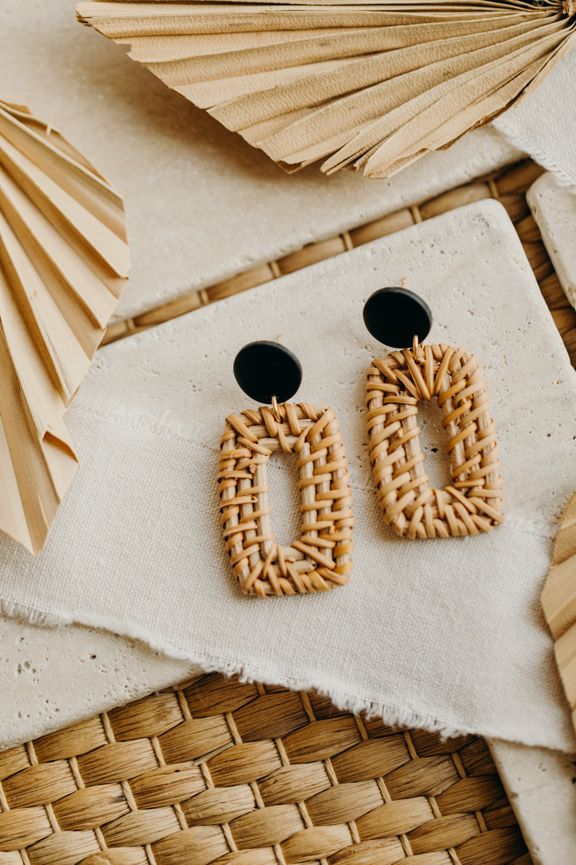 black polymer clay earrings with rattan pendant rectangle