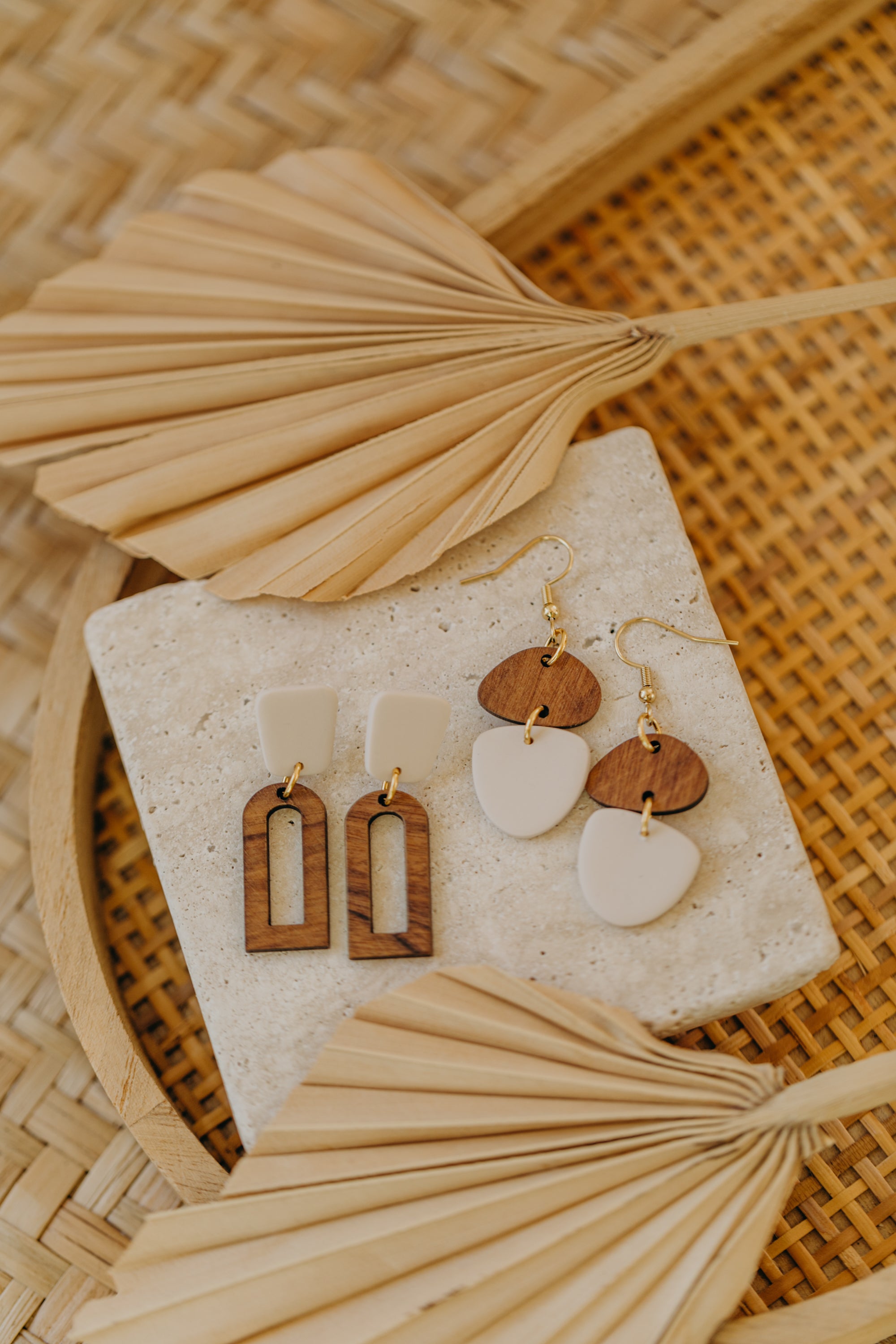 triangular polymer clay earrings in eucalyptus green with rectangular wooden pendant