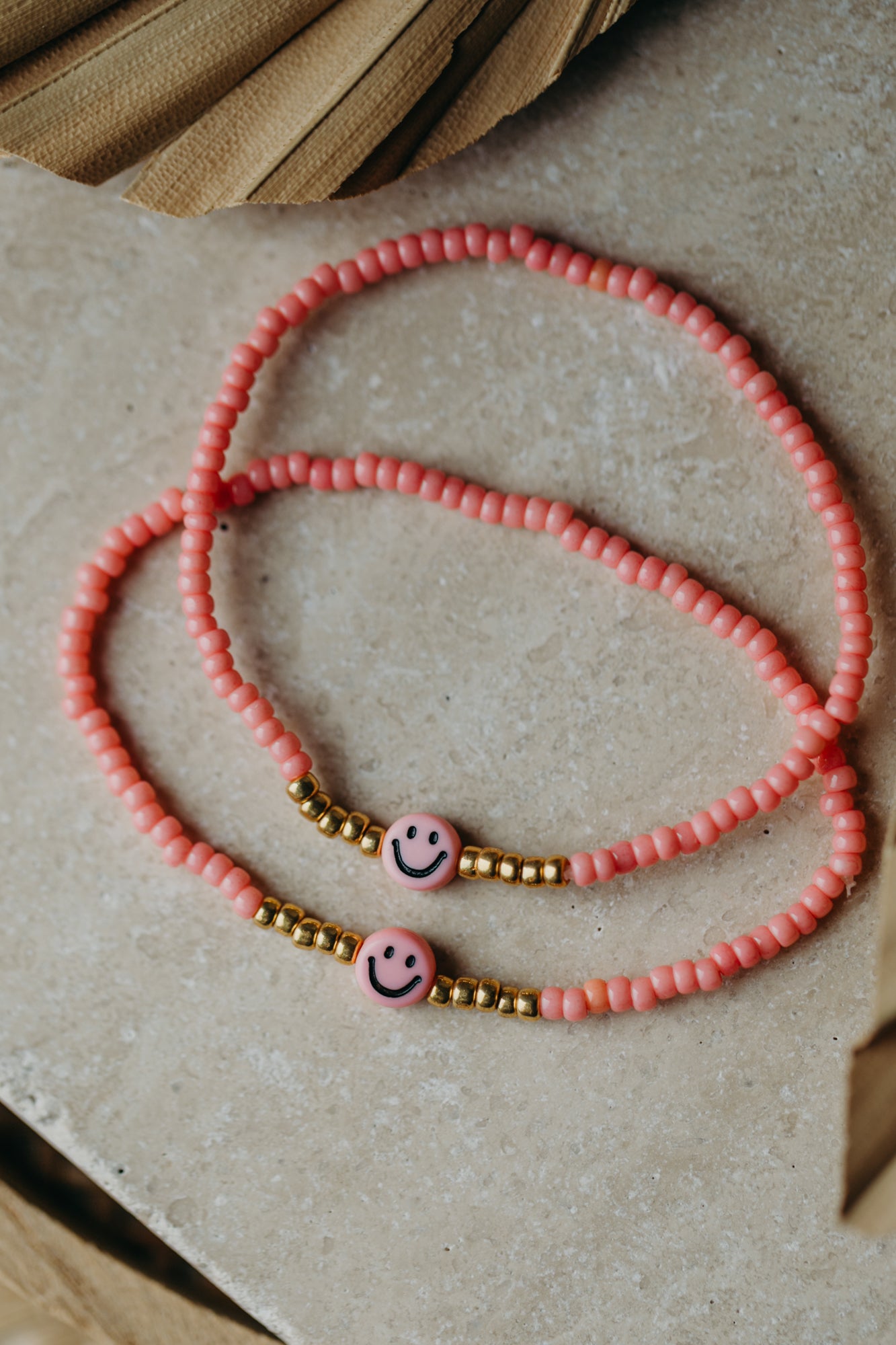 Smiley Armband in Koralle