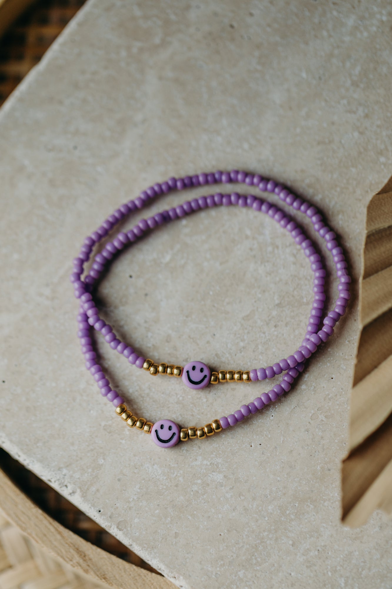 Lila Smiley Armband