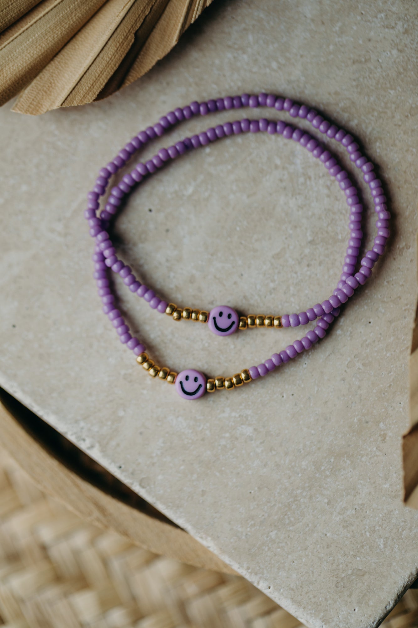 Lila Smiley Armband