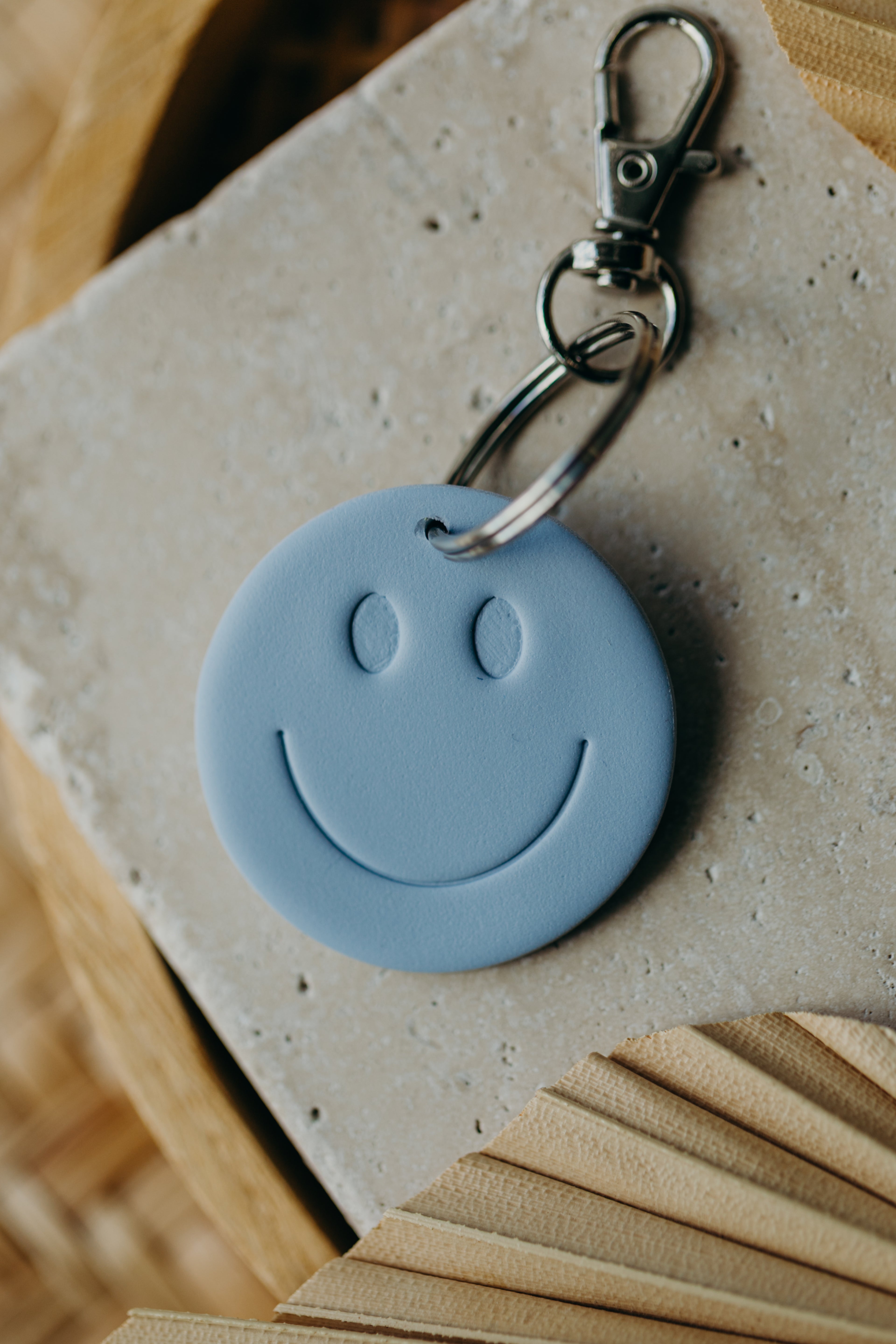 SMILEY Keychain Light Blue
