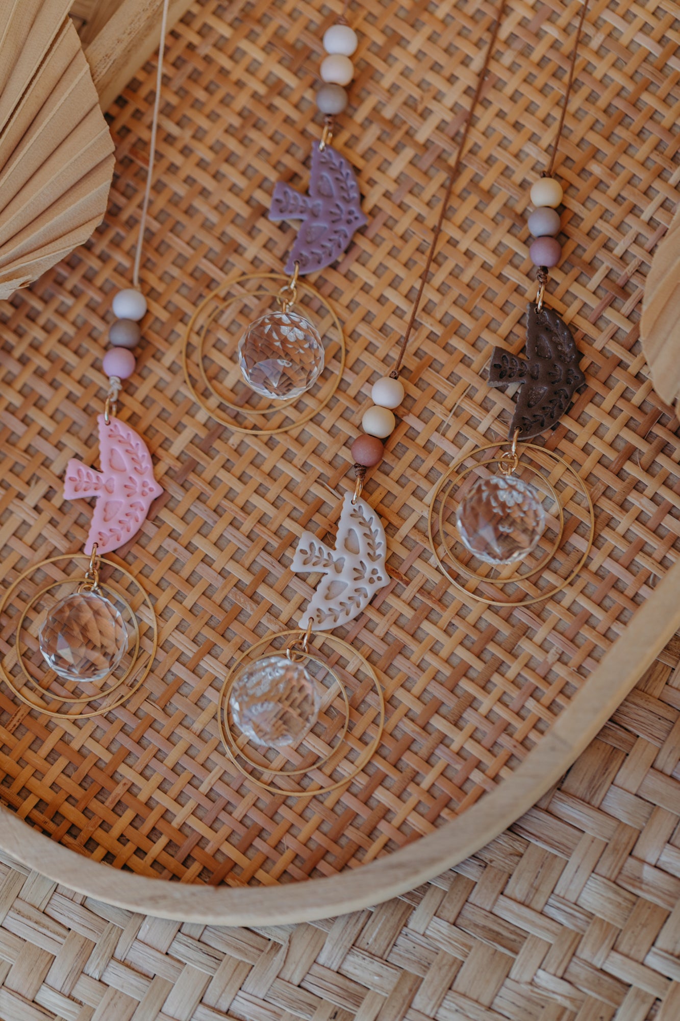 Sonnenfänger mit kleinem Vogel