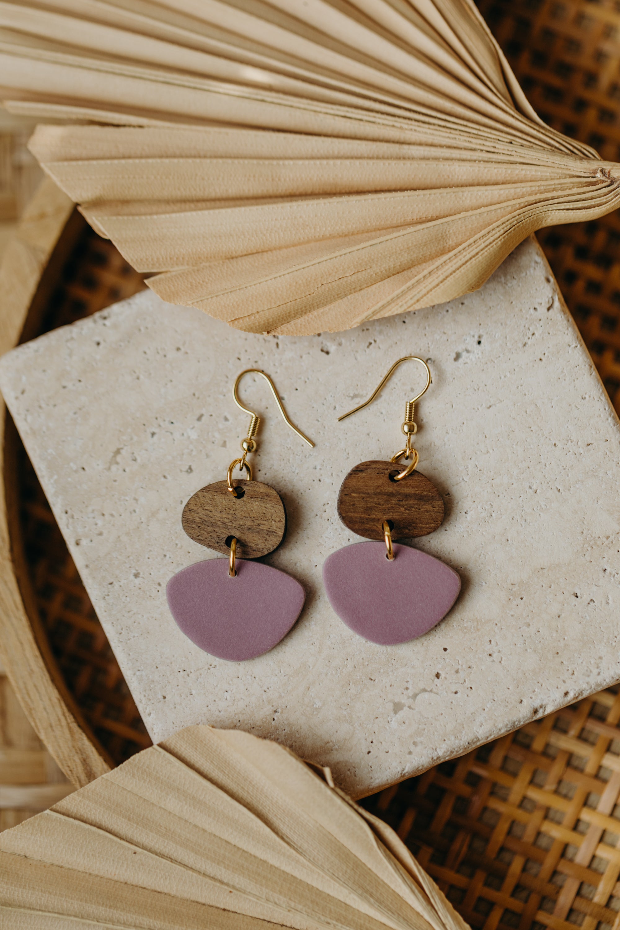 triangular polymer clay earrings in eucalyptus green with rectangular wooden pendant