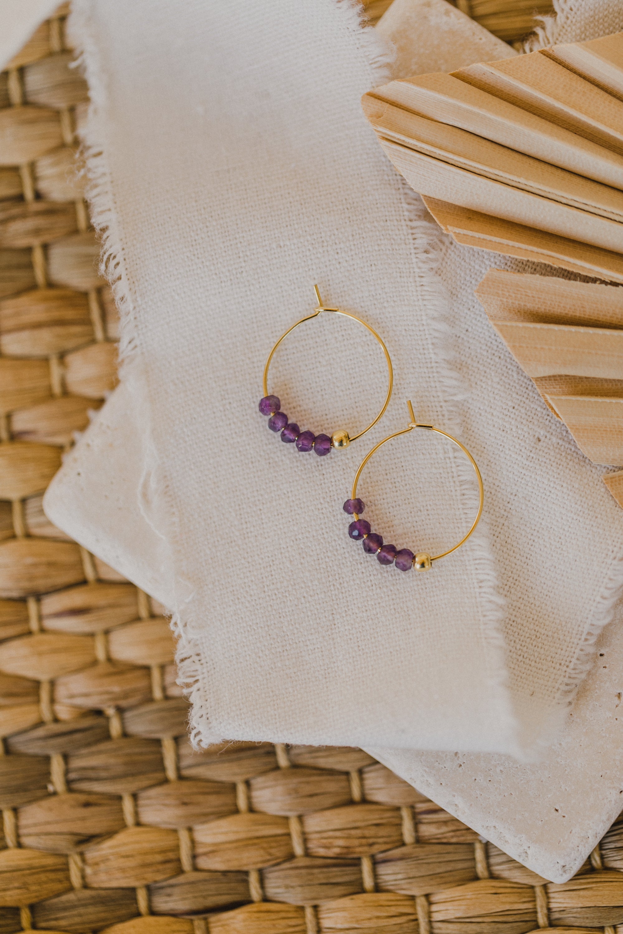 filigree creole made of titanium with amethyst pearls purple