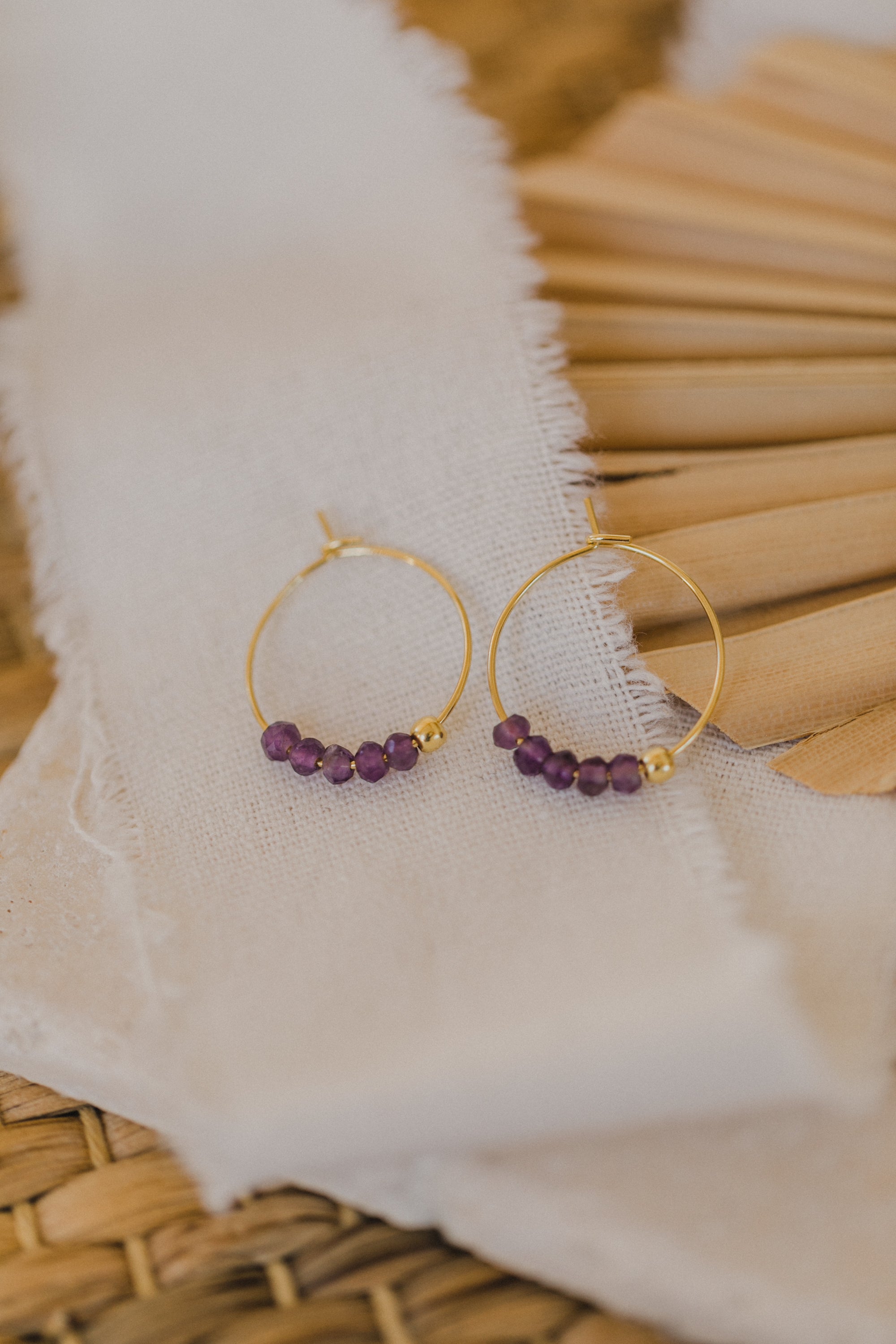 filigree creole made of titanium with amethyst pearls purple