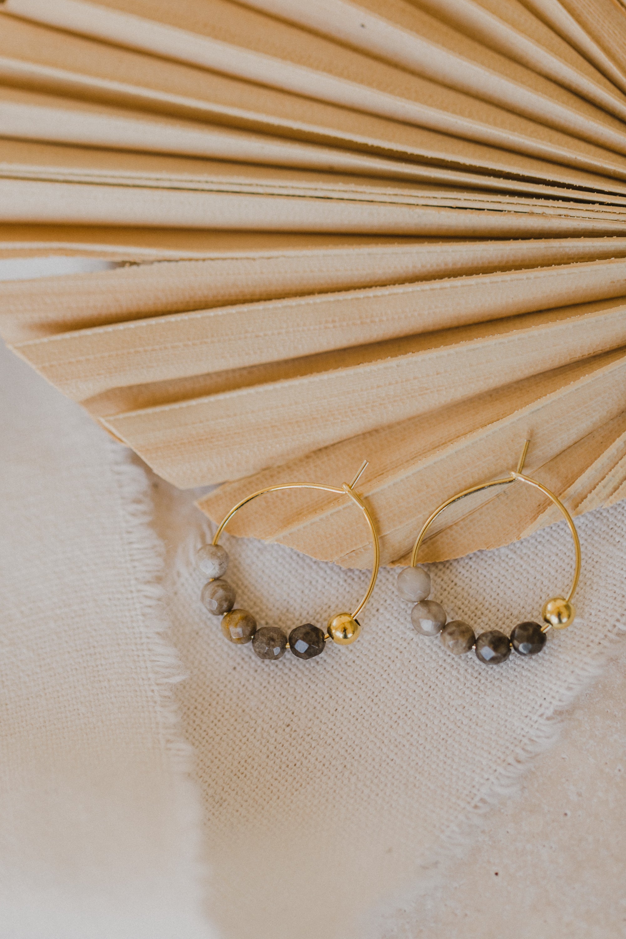 filigree creole made of titanium with jasper gemstone beads