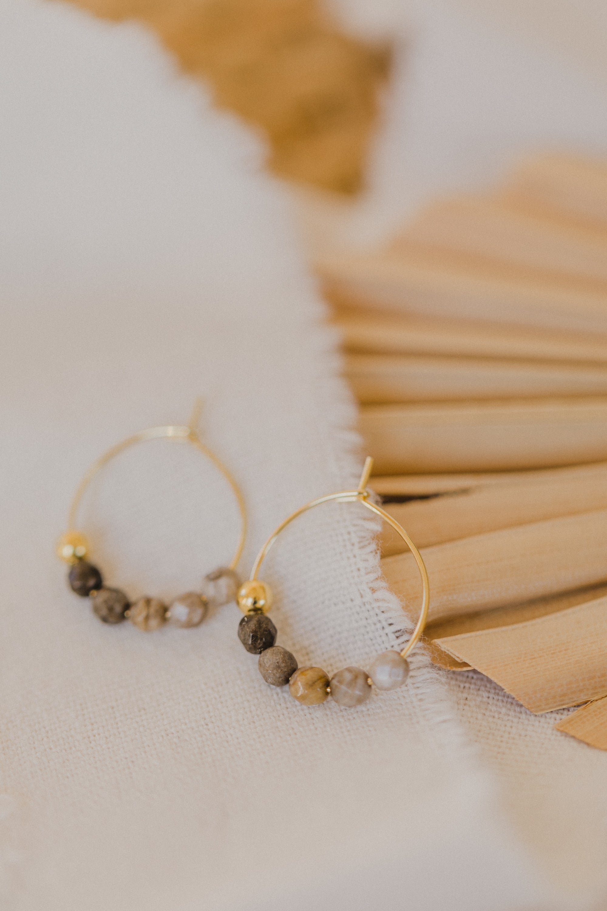 filigree creole made of titanium with jasper gemstone beads