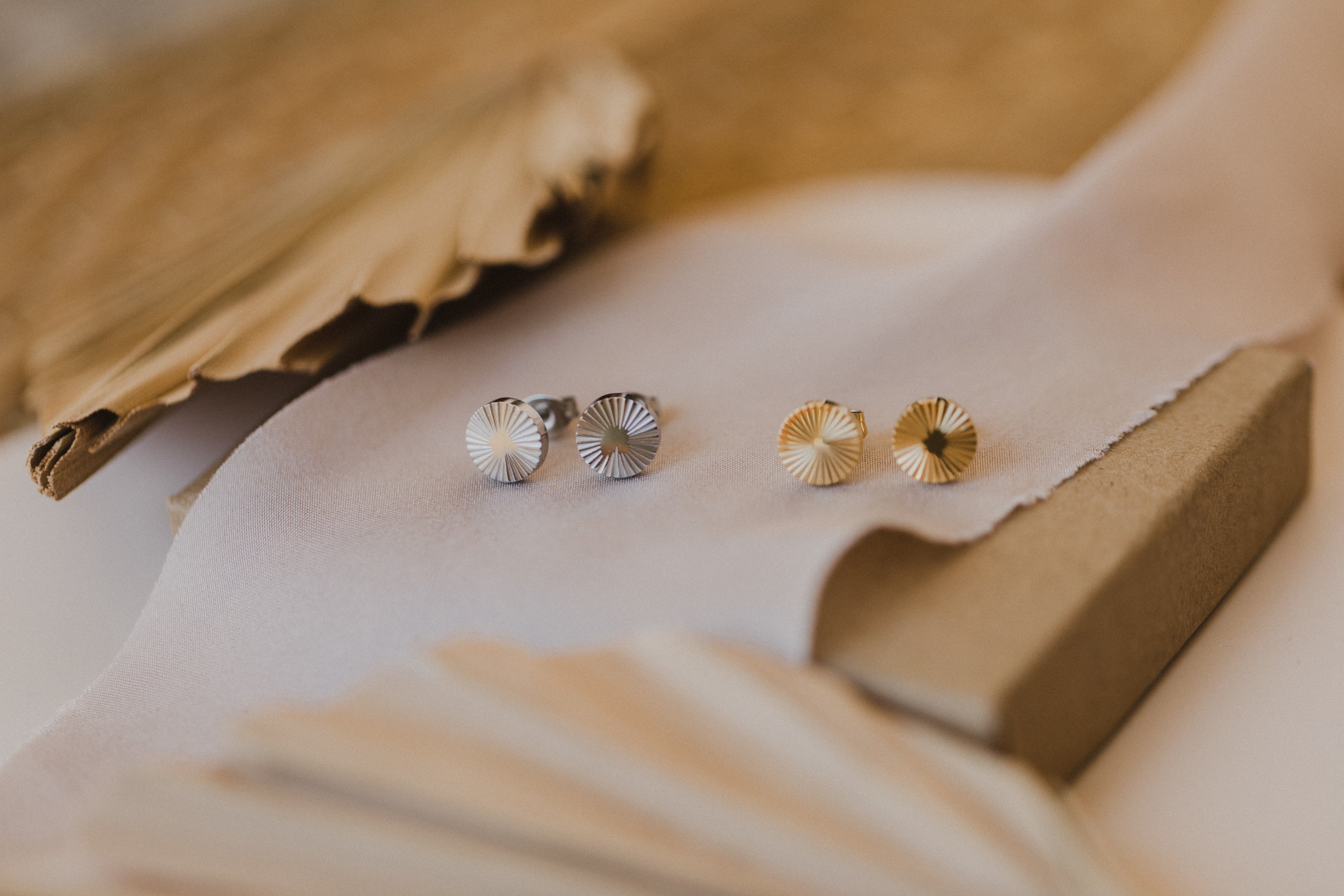 round titanium stud earrings with pattern