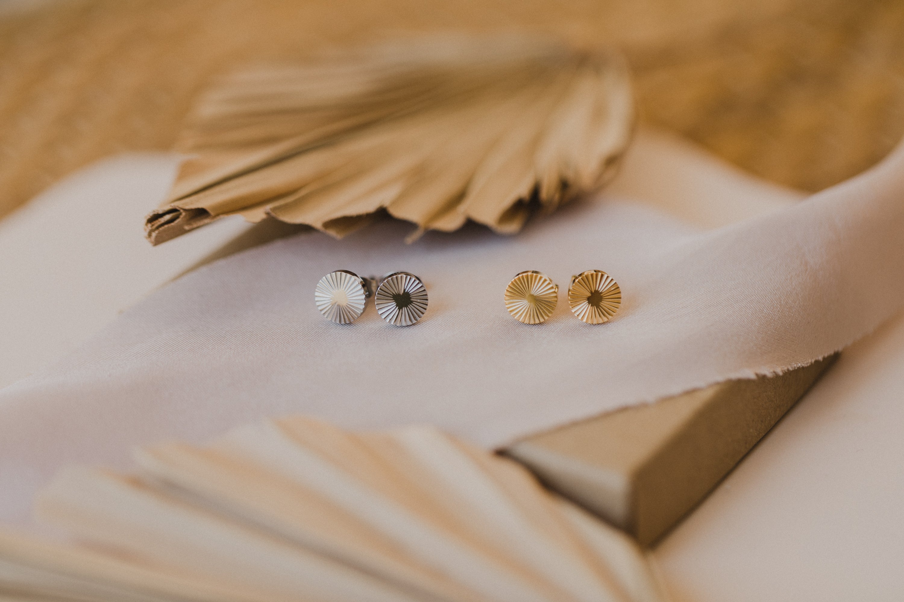 round titanium stud earrings with pattern