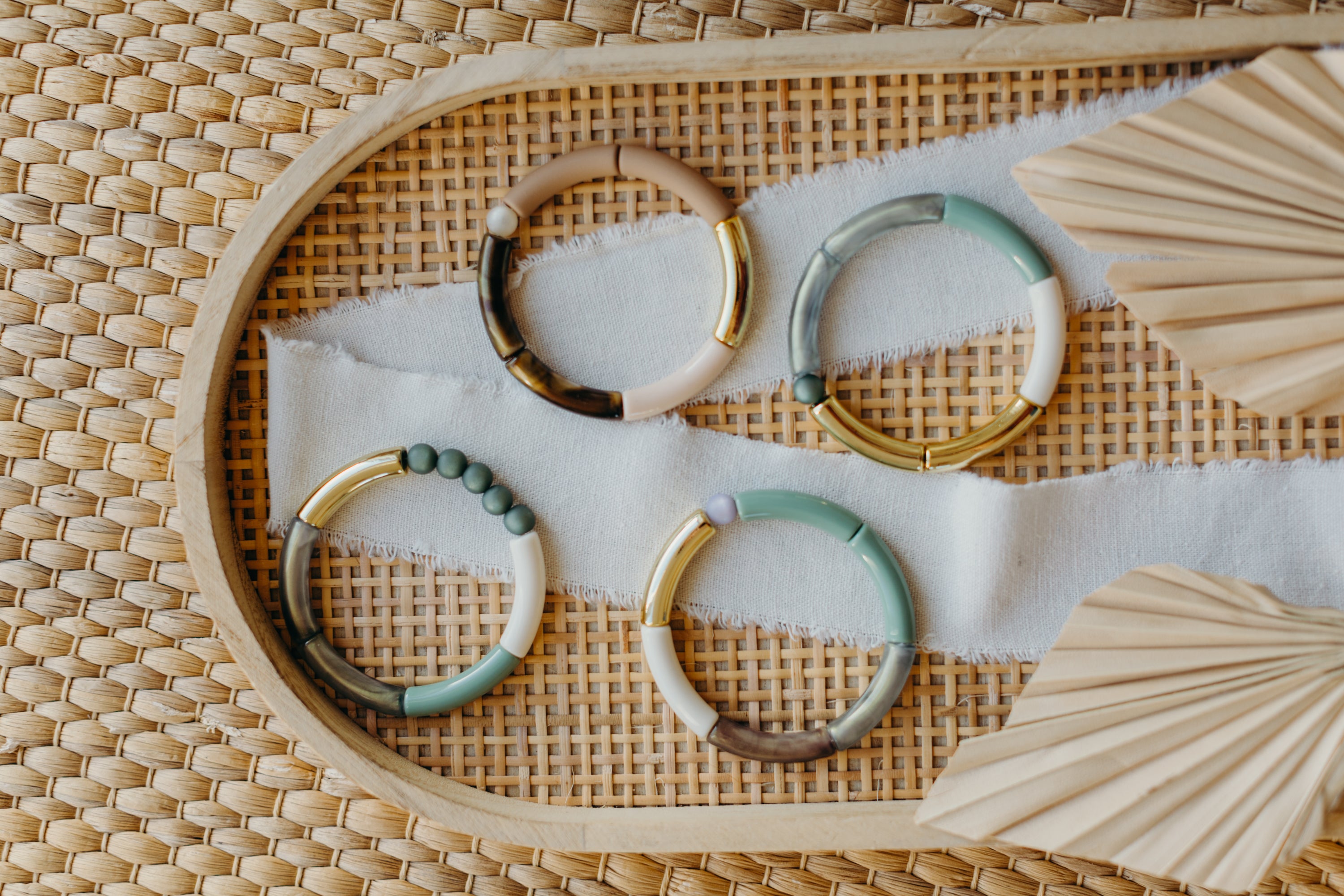 Pearl bracelet with tube pearls in gold, brown, cream and mint