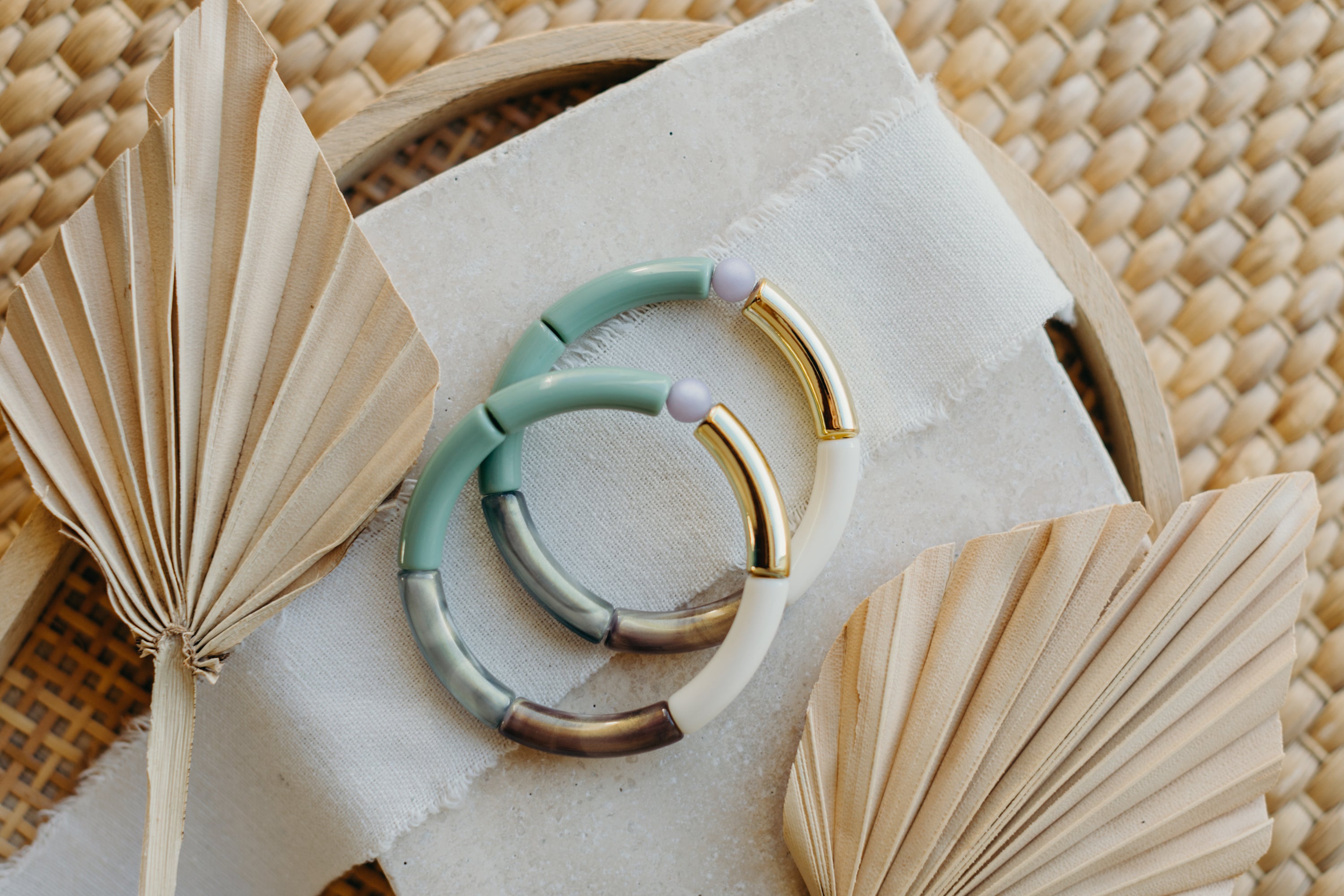 Pearl bracelet with tube pearls in gold, brown, cream and mint