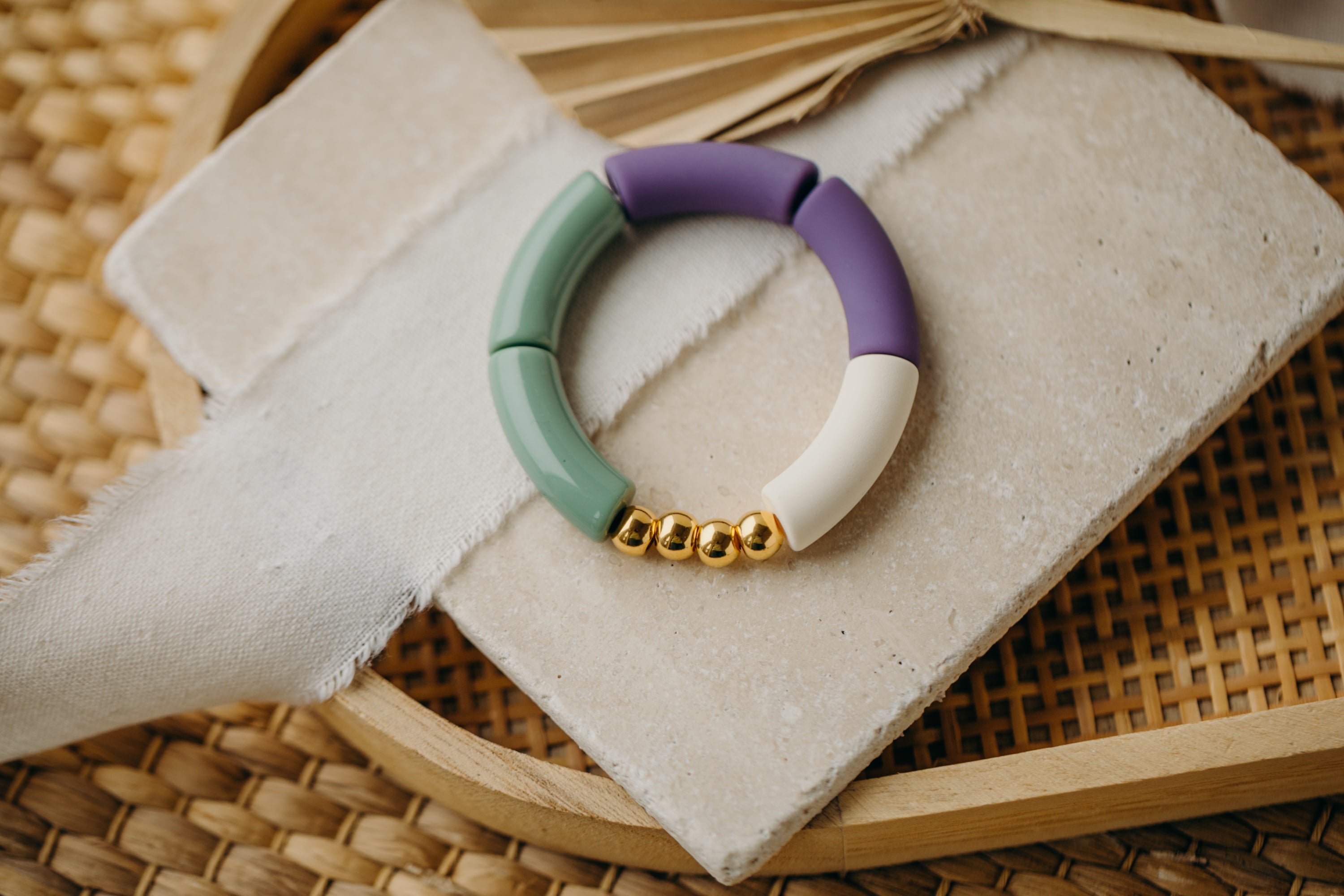 Pearl bracelet with tube beads in purple, mint, white and gold