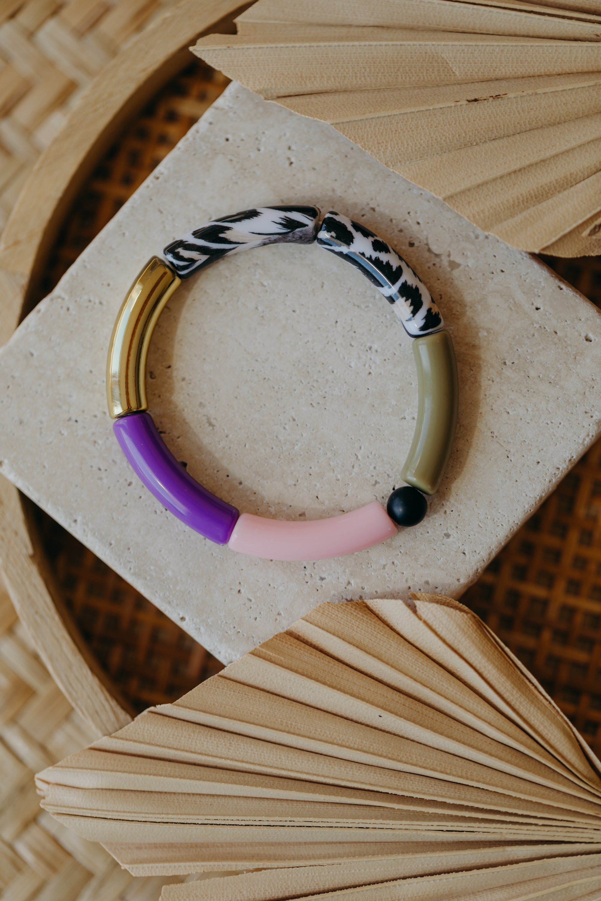 Pearl bracelet with tube pearls in gold, cream, yellow and purple