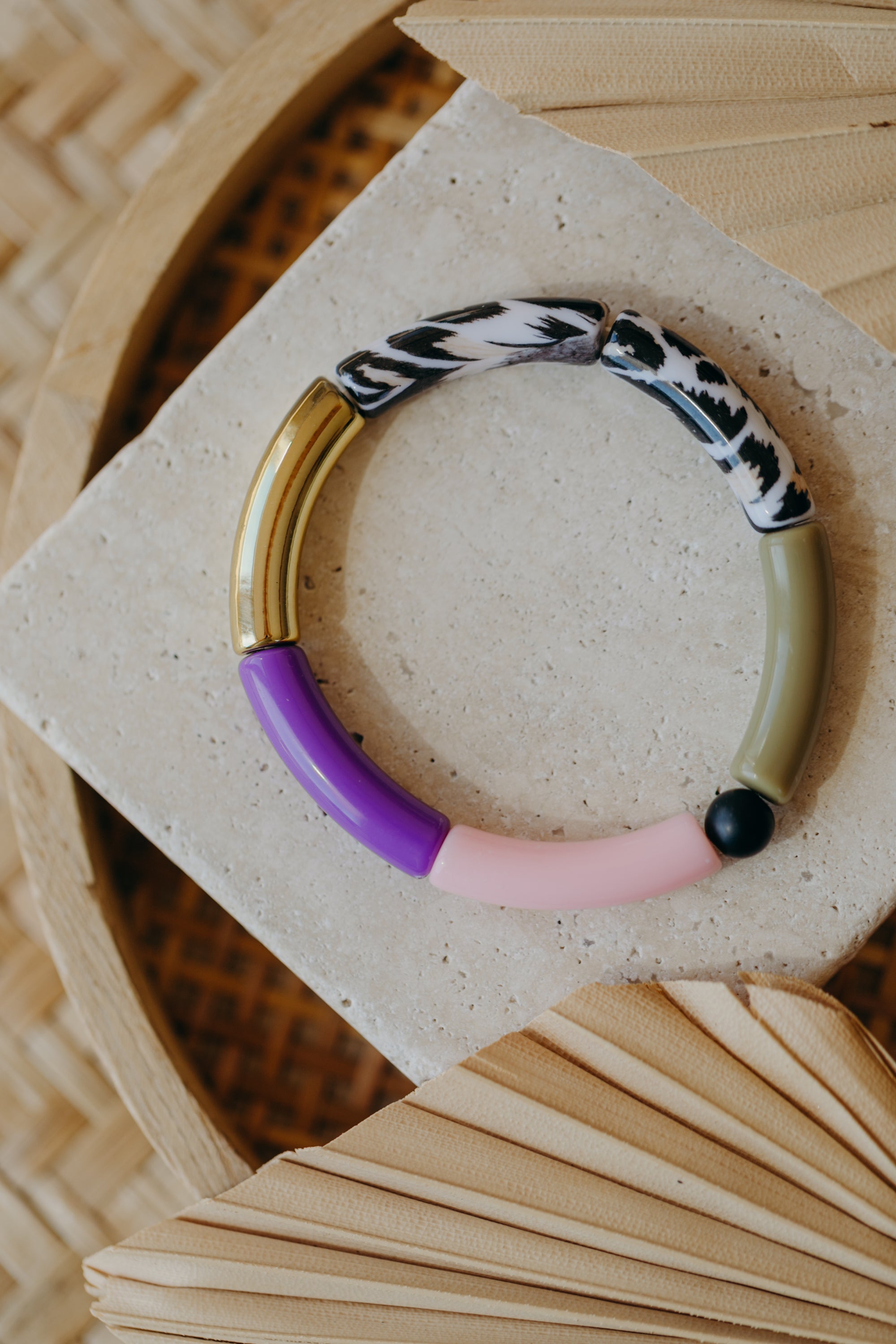 Pearl bracelet with tube pearls in gold, cream, yellow and purple