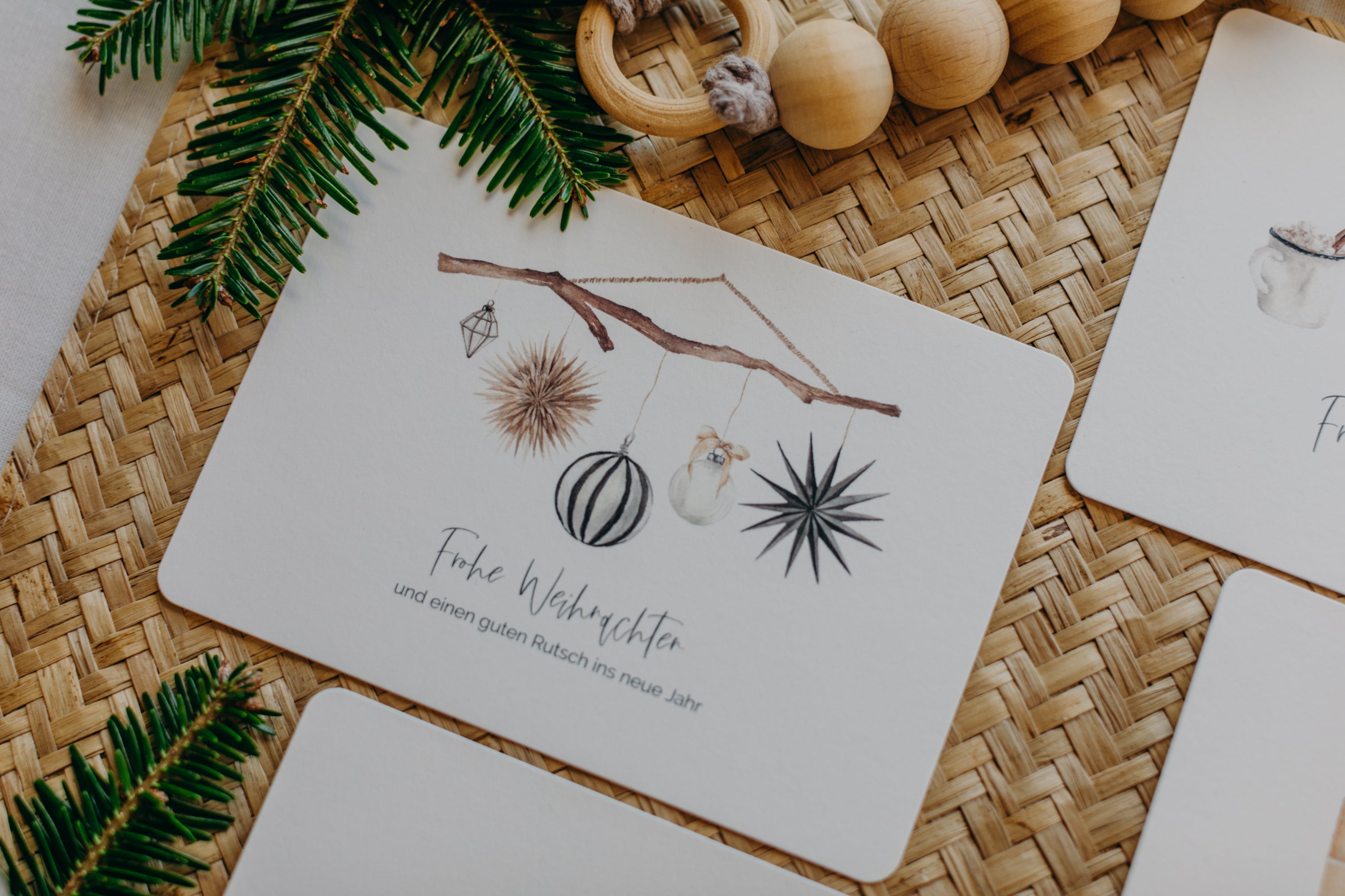 Christmas postcard branch with black and white Christmas motifs