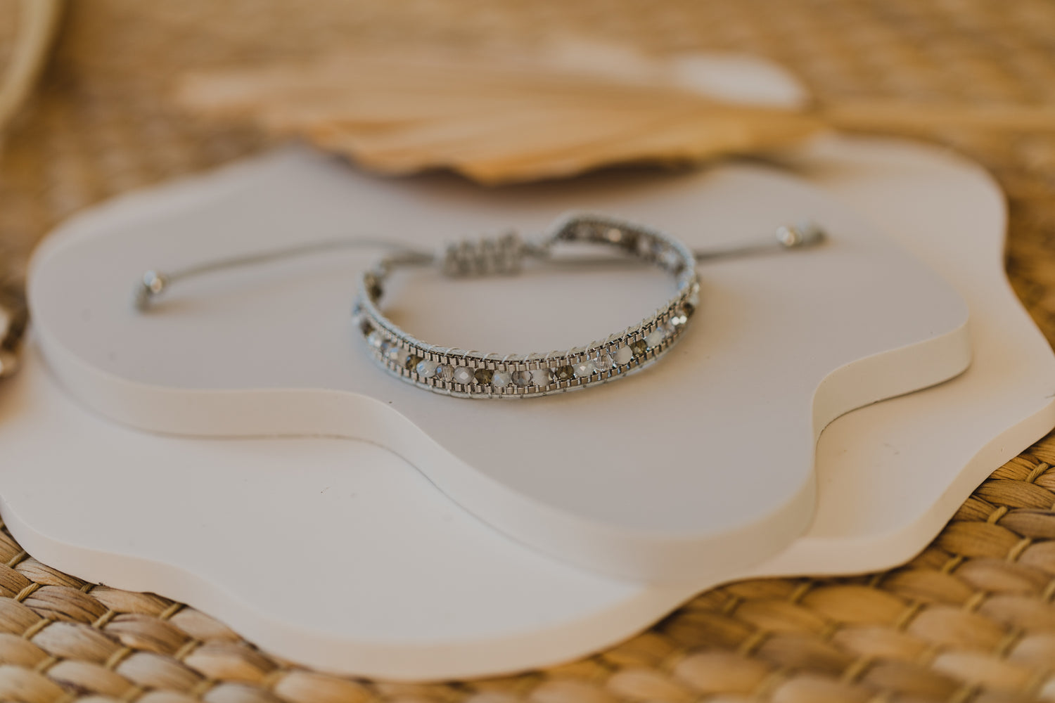 white or grey bracelet made of rocaille beads