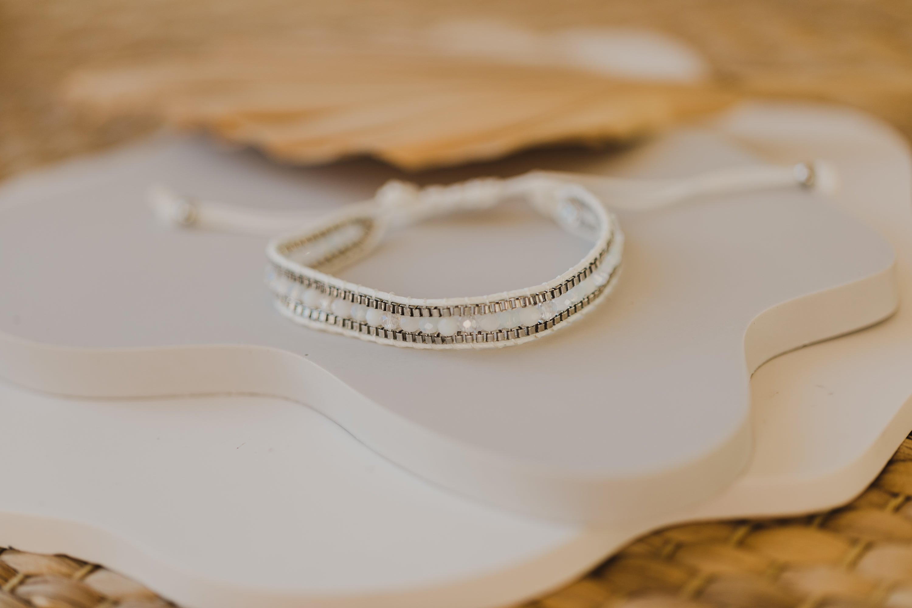 white or grey bracelet made of rocaille beads