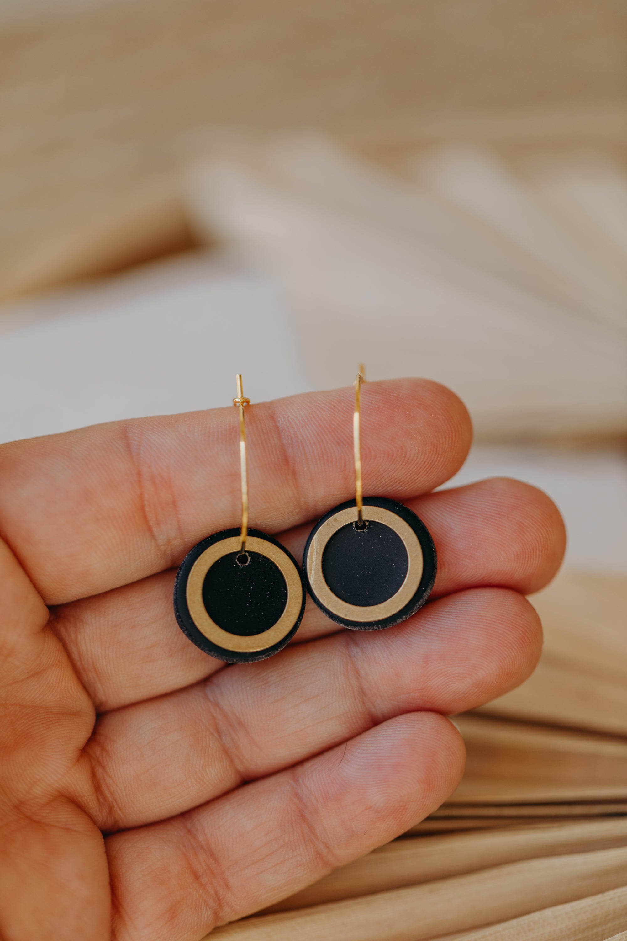 Hoop earrings with round polymer clay pendant and leaf