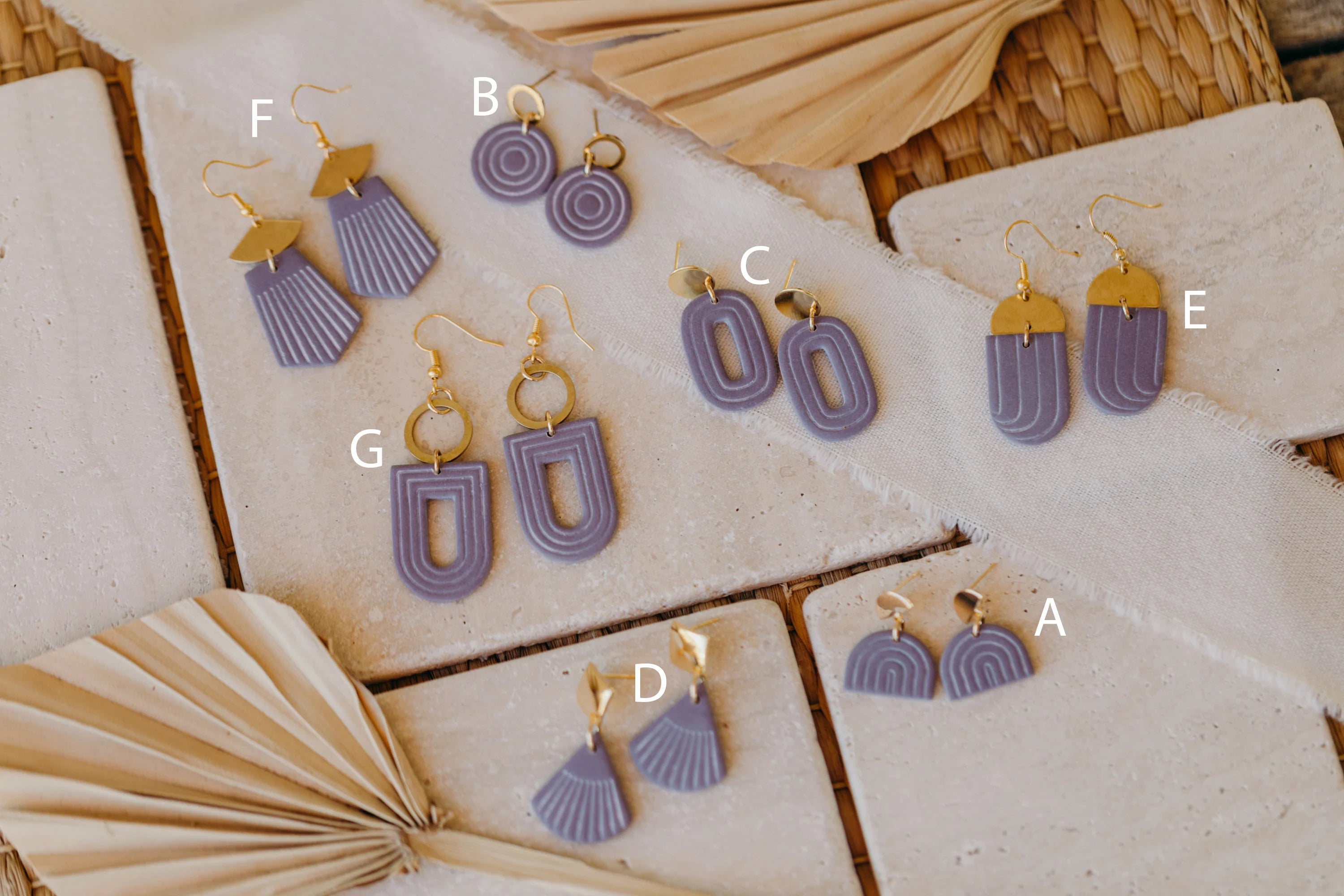 light purple polymer clay earrings with white lines