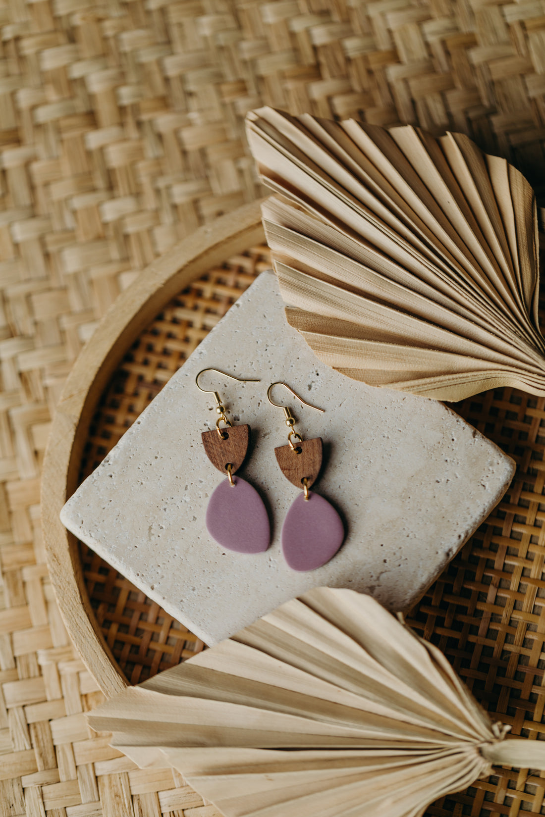 triangular polymer clay earrings in eucalyptus green with rectangular wooden pendant