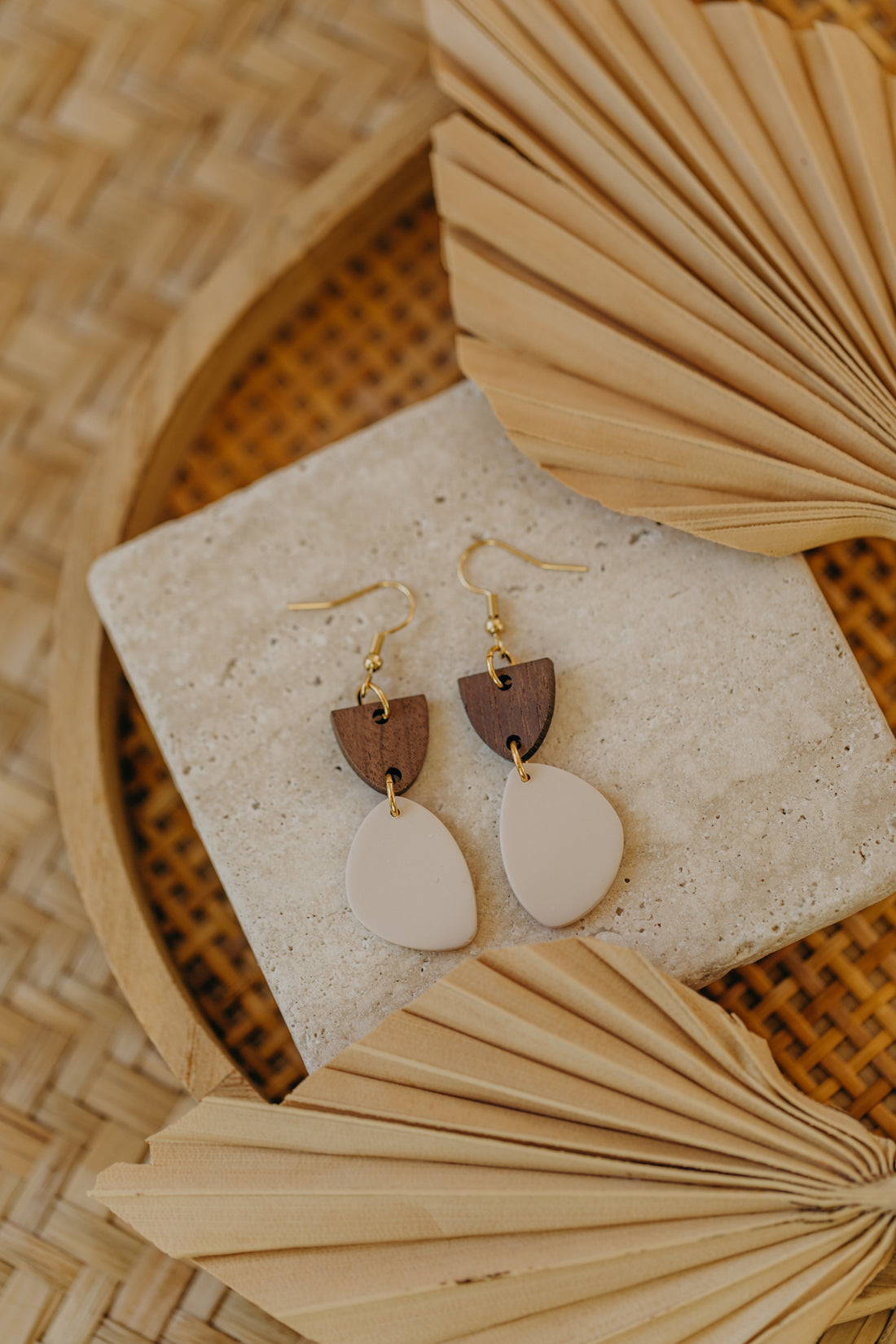 triangular polymer clay earrings in eucalyptus green with rectangular wooden pendant
