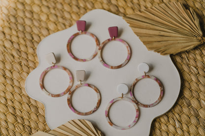 golden earrings with acrylic in white, petrol and brown