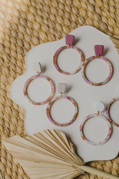 golden earrings with acrylic in white, petrol and brown