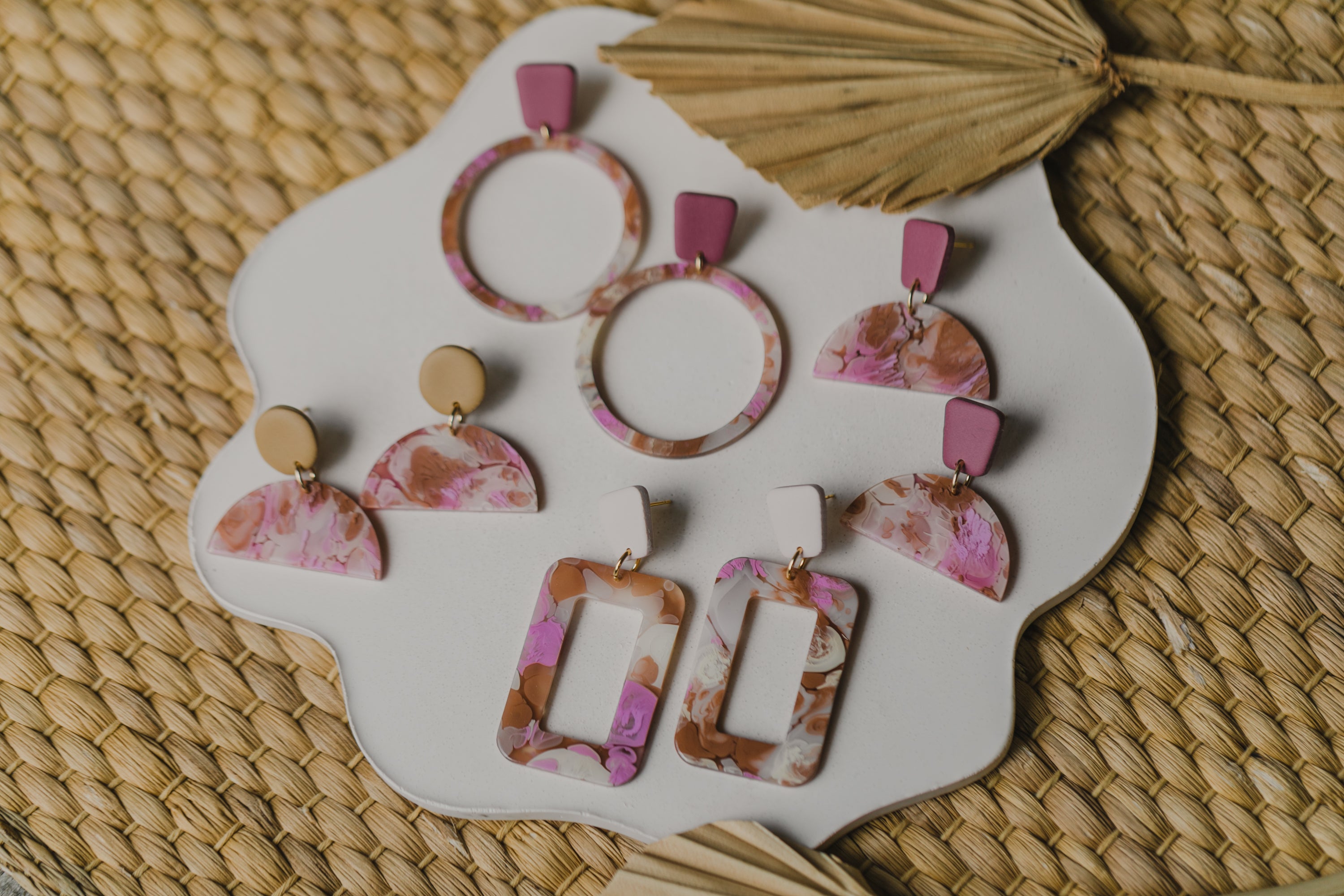 golden earrings with acrylic in white, petrol and brown