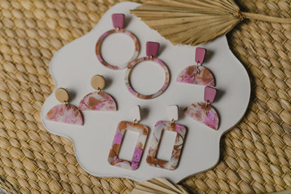 golden earrings with acrylic in white, petrol and brown