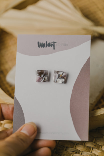 golden earrings with acrylic in white, petrol and brown