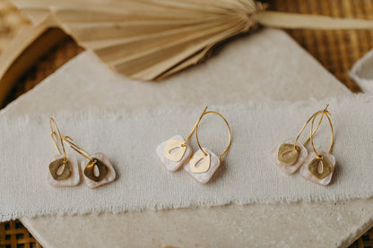 Hoop earrings with pink pendant
