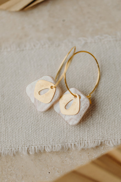 Hoop earrings with pink pendant