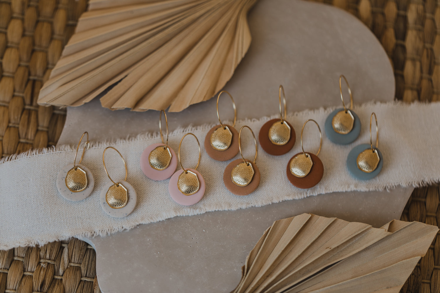 Hoop earrings with round polymer clay pendant and leaf