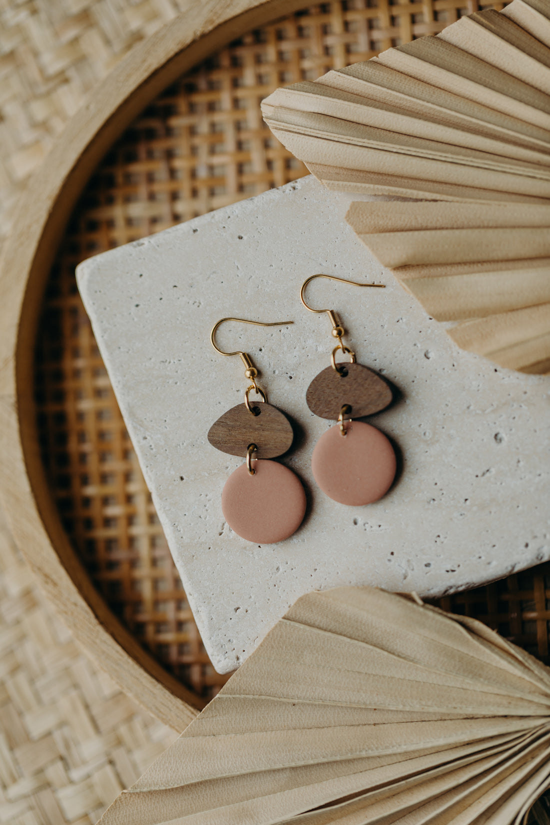 triangular polymer clay earrings in eucalyptus green with rectangular wooden pendant