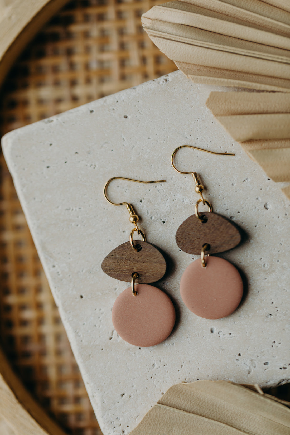 triangular polymer clay earrings in eucalyptus green with rectangular wooden pendant