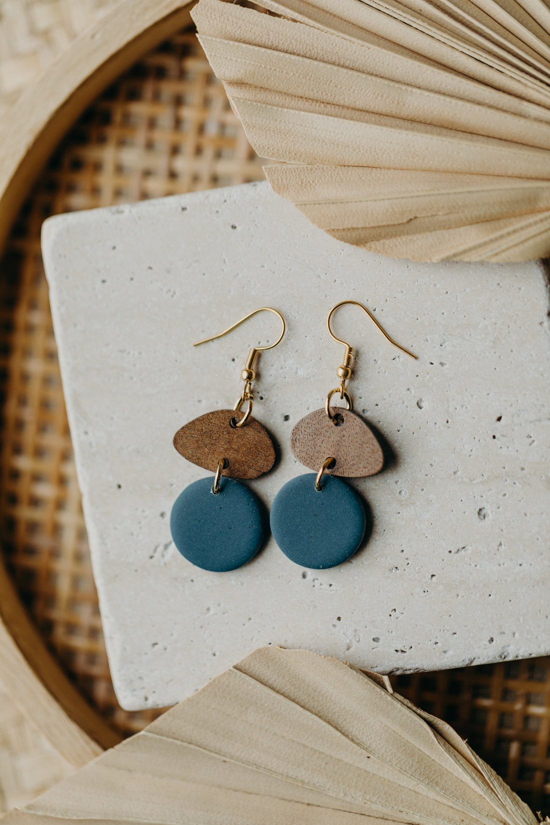 triangular polymer clay earrings in eucalyptus green with rectangular wooden pendant