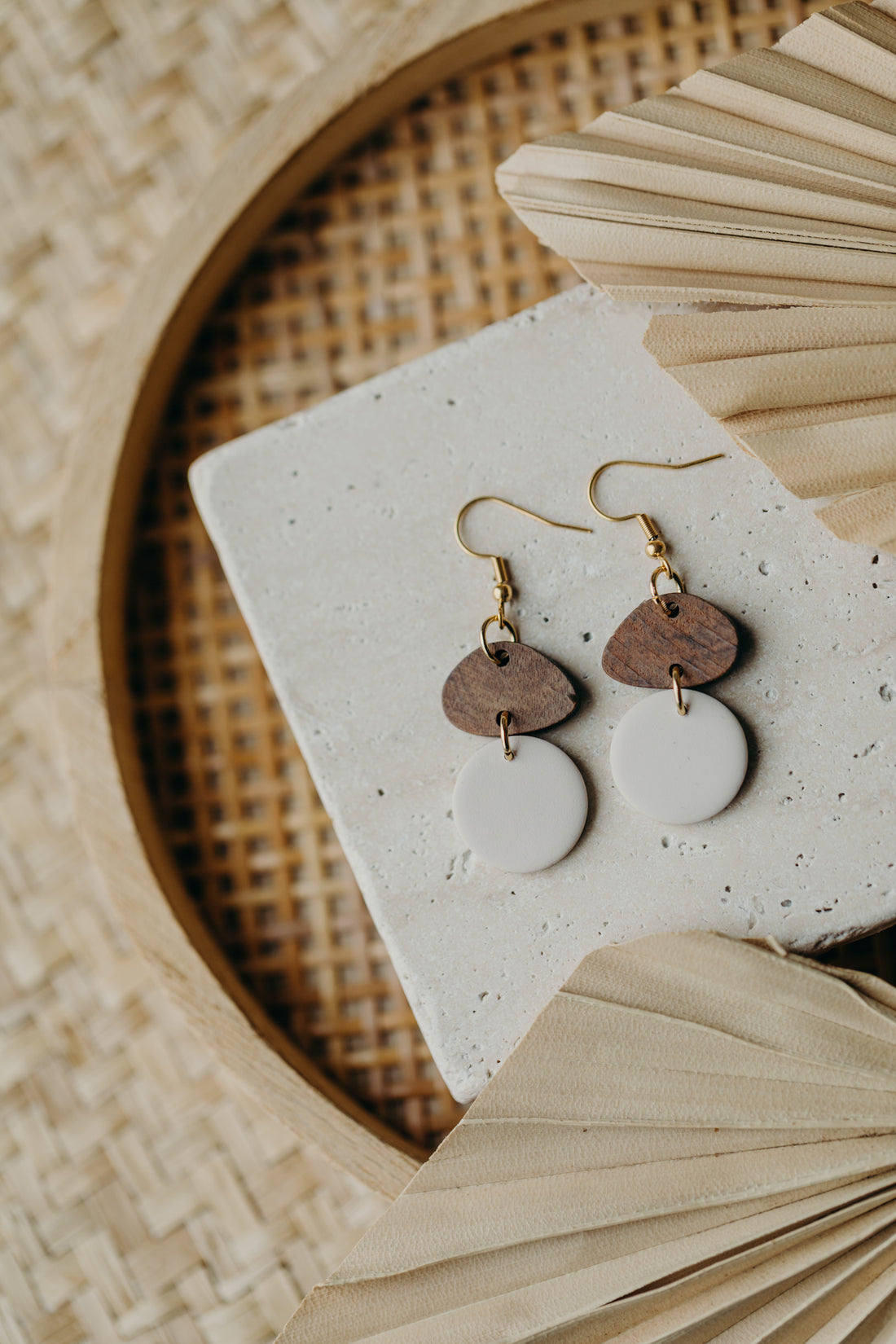 triangular polymer clay earrings in eucalyptus green with rectangular wooden pendant