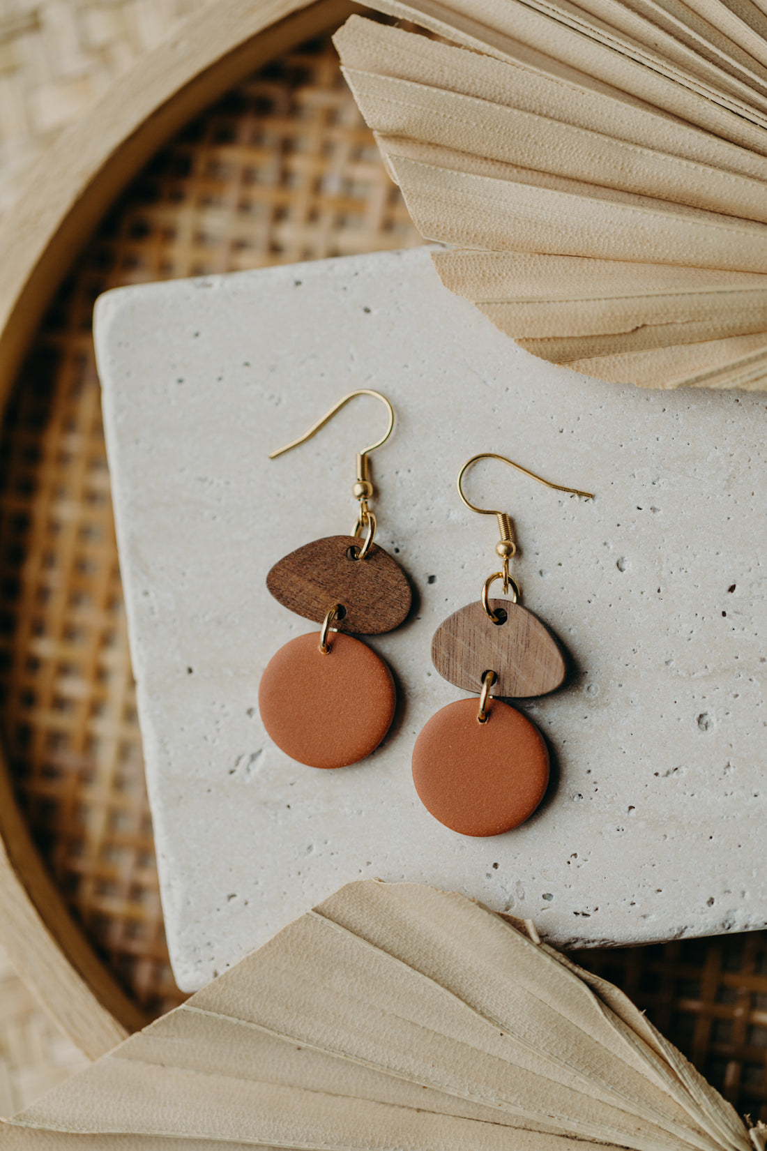 triangular polymer clay earrings in eucalyptus green with rectangular wooden pendant