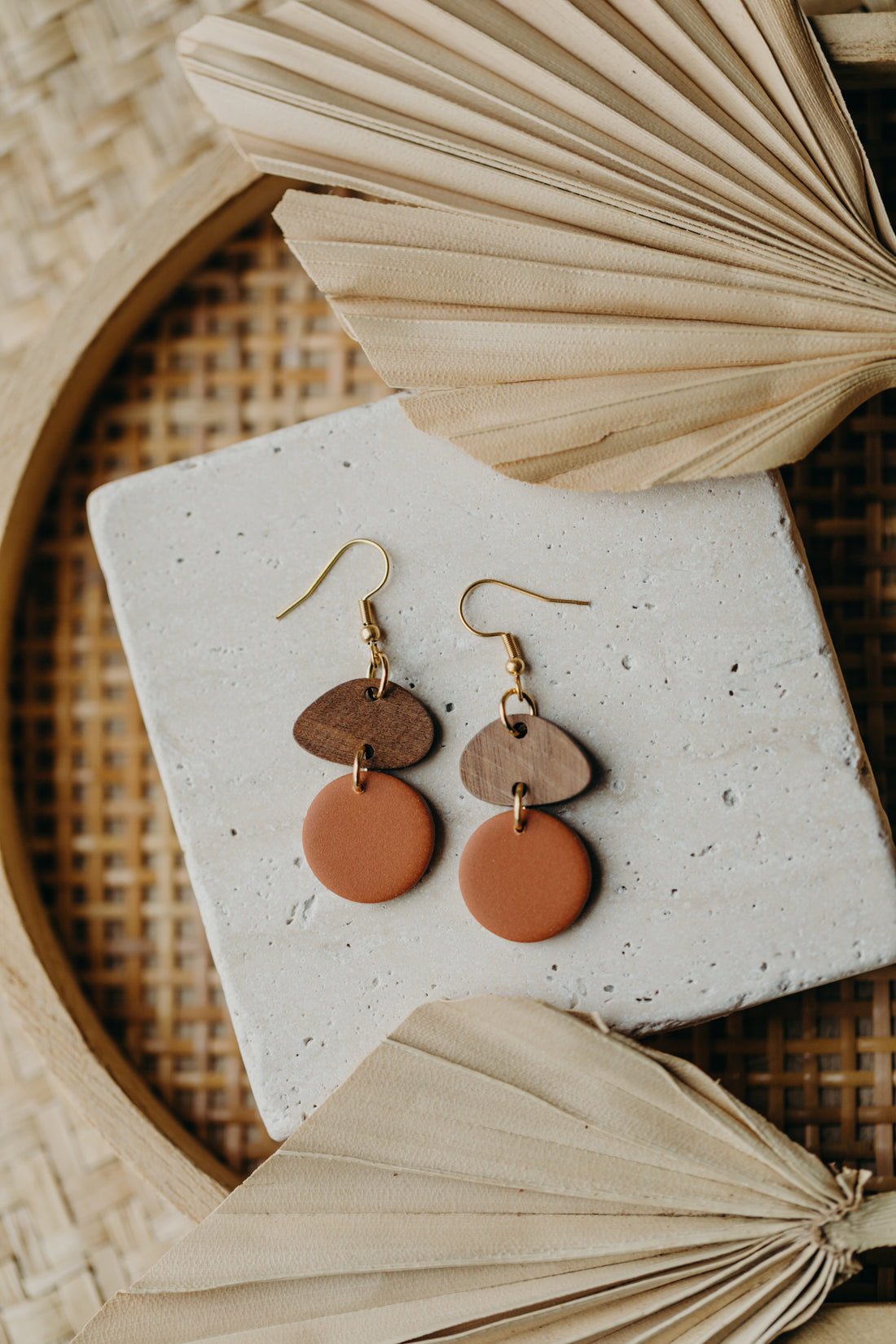 triangular polymer clay earrings in eucalyptus green with rectangular wooden pendant