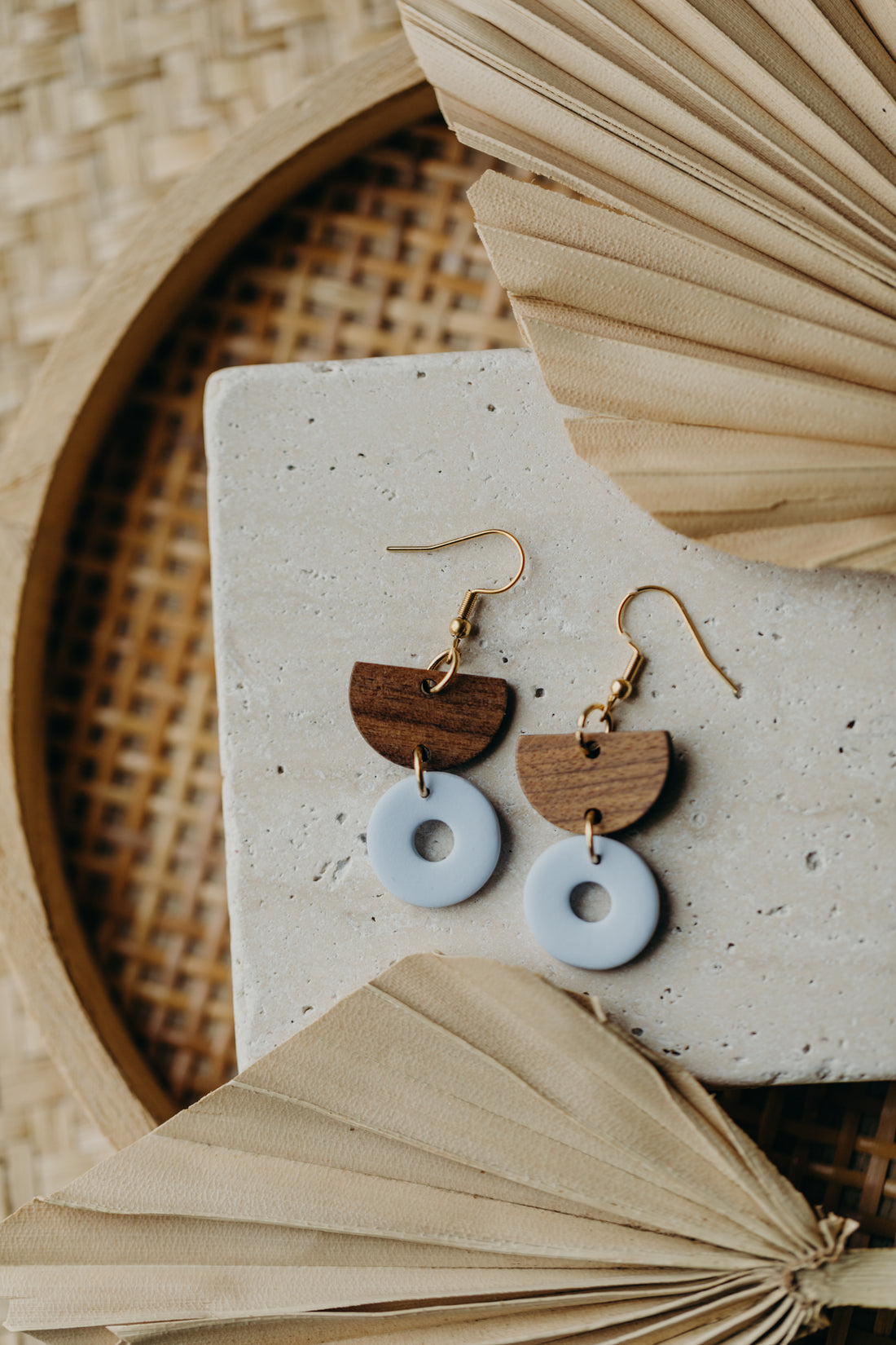 triangular polymer clay earrings in eucalyptus green with rectangular wooden pendant