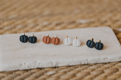 golden earrings with acrylic in white, petrol and brown