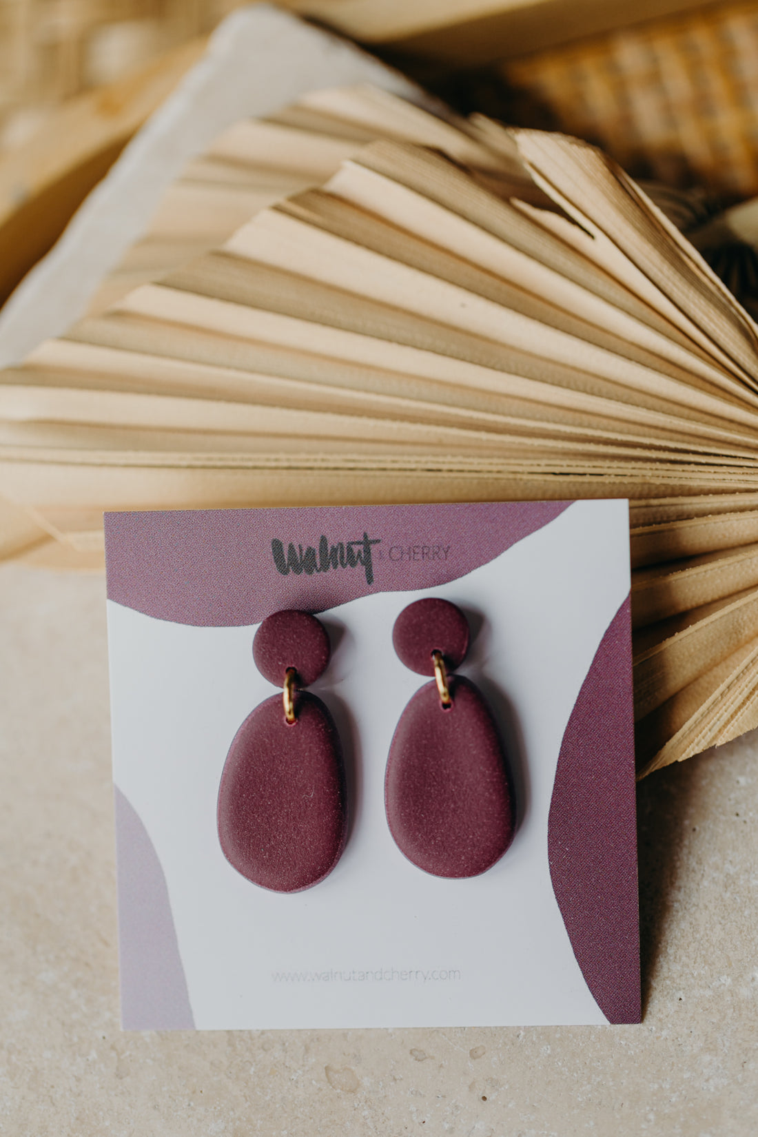 ILVA - oval merlot-colored polymer clay earrings
