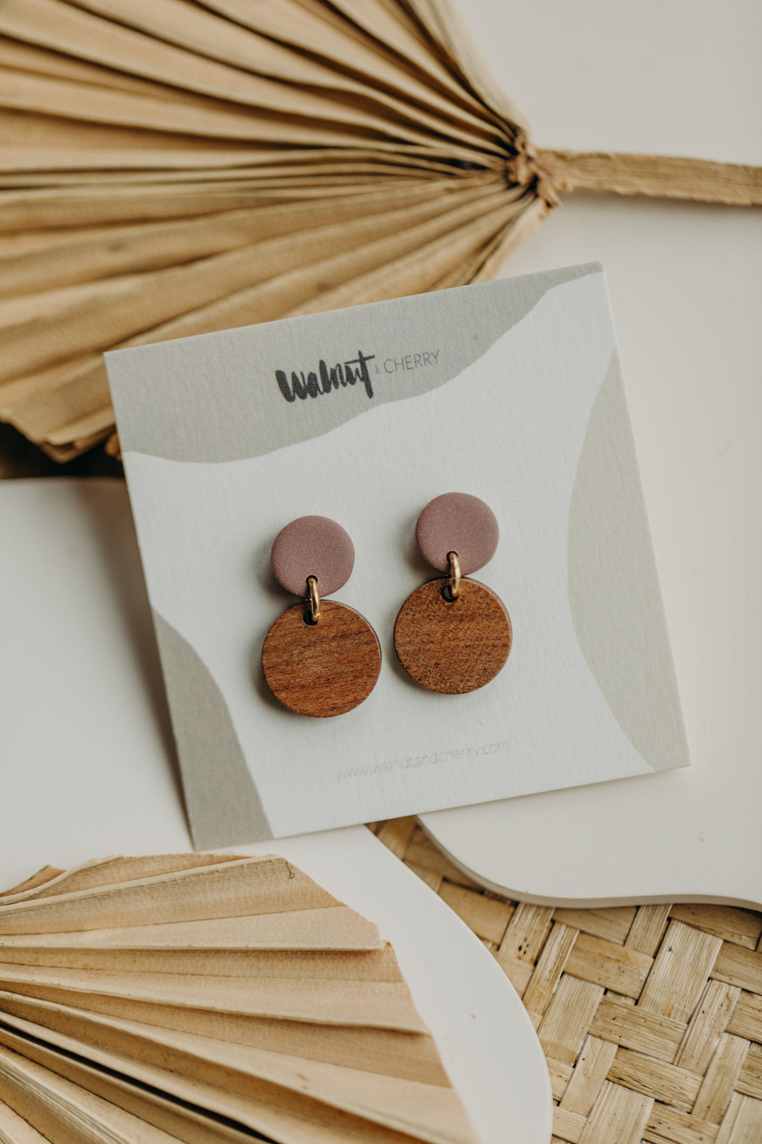 round pastel blue polymer clay earrings with round wooden pendant