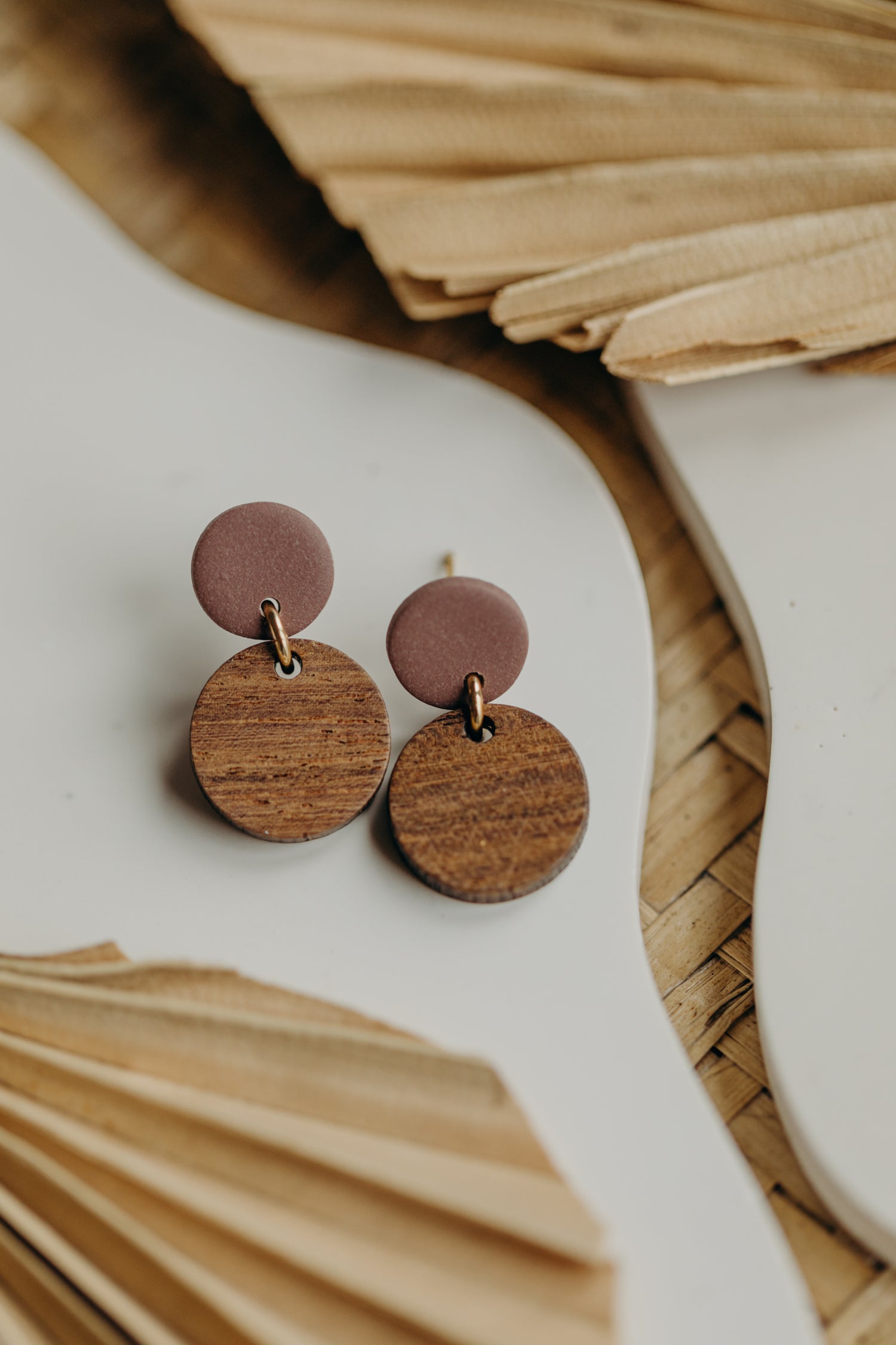 round pastel blue polymer clay earrings with round wooden pendant