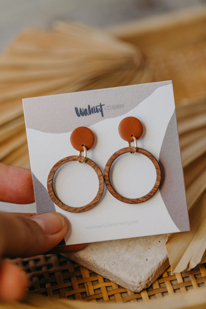 Cinnamon colored polymer clay earrings with wooden pendant circle