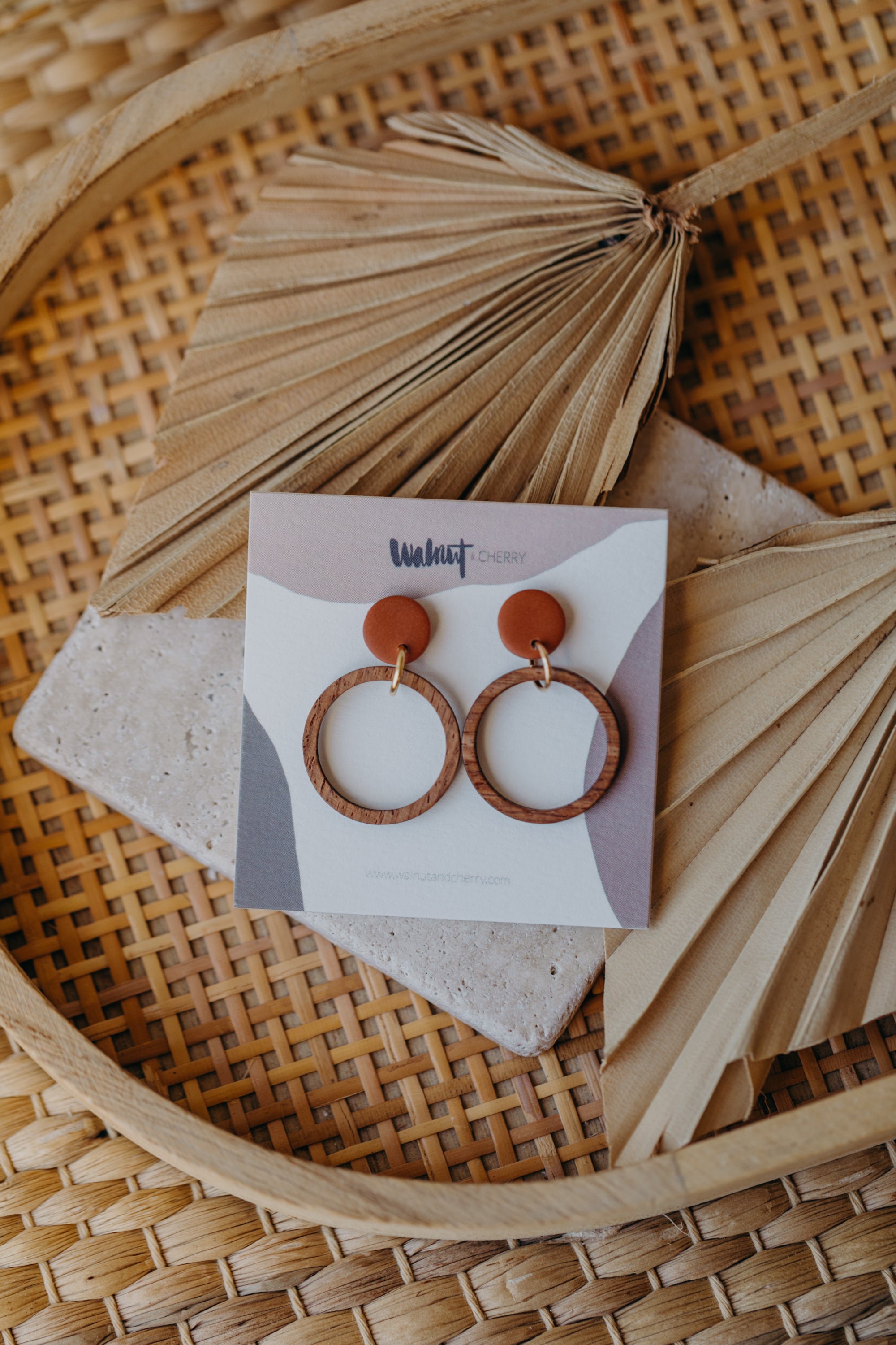 Cinnamon colored polymer clay earrings with wooden pendant circle