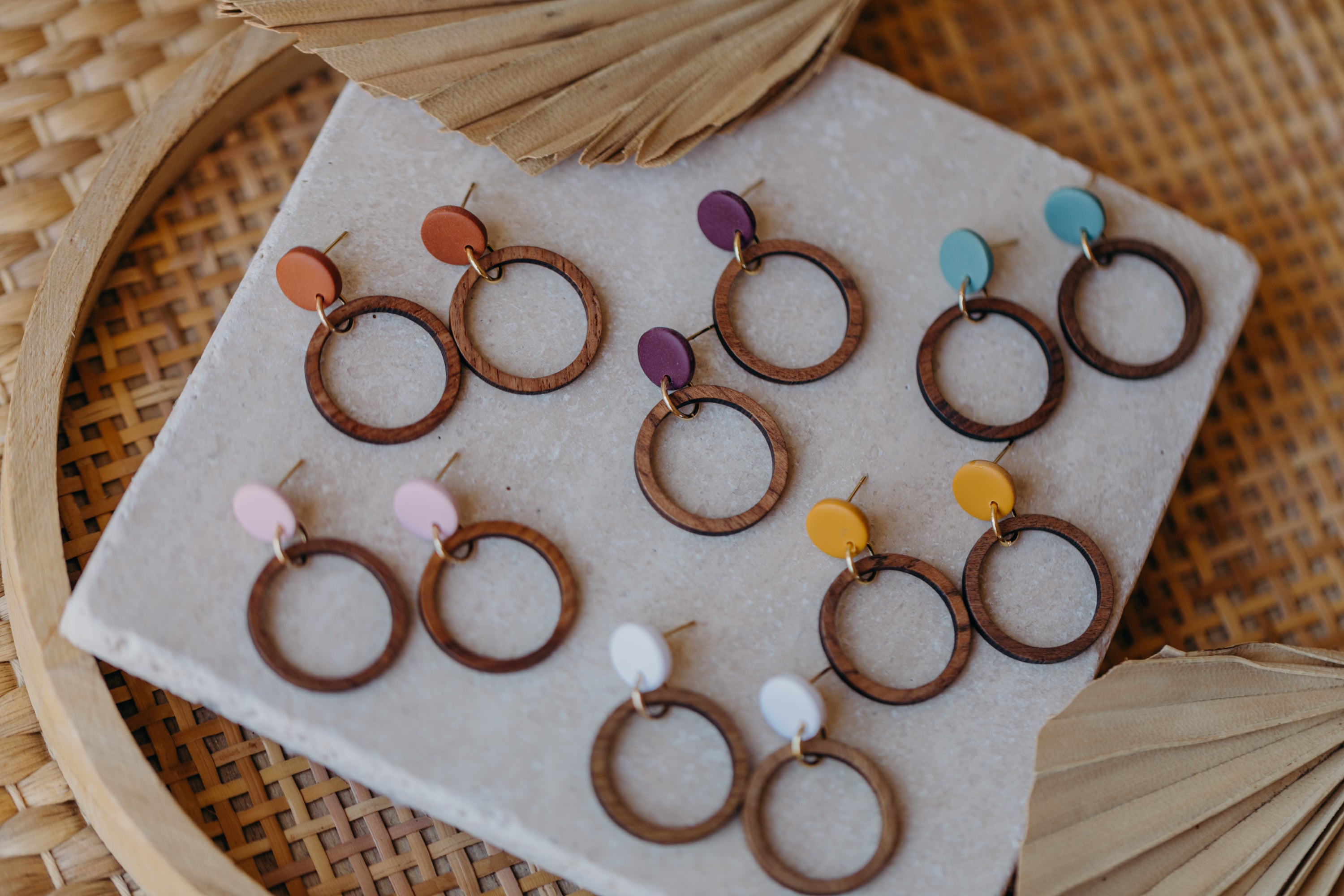 Cinnamon colored polymer clay earrings with wooden pendant circle
